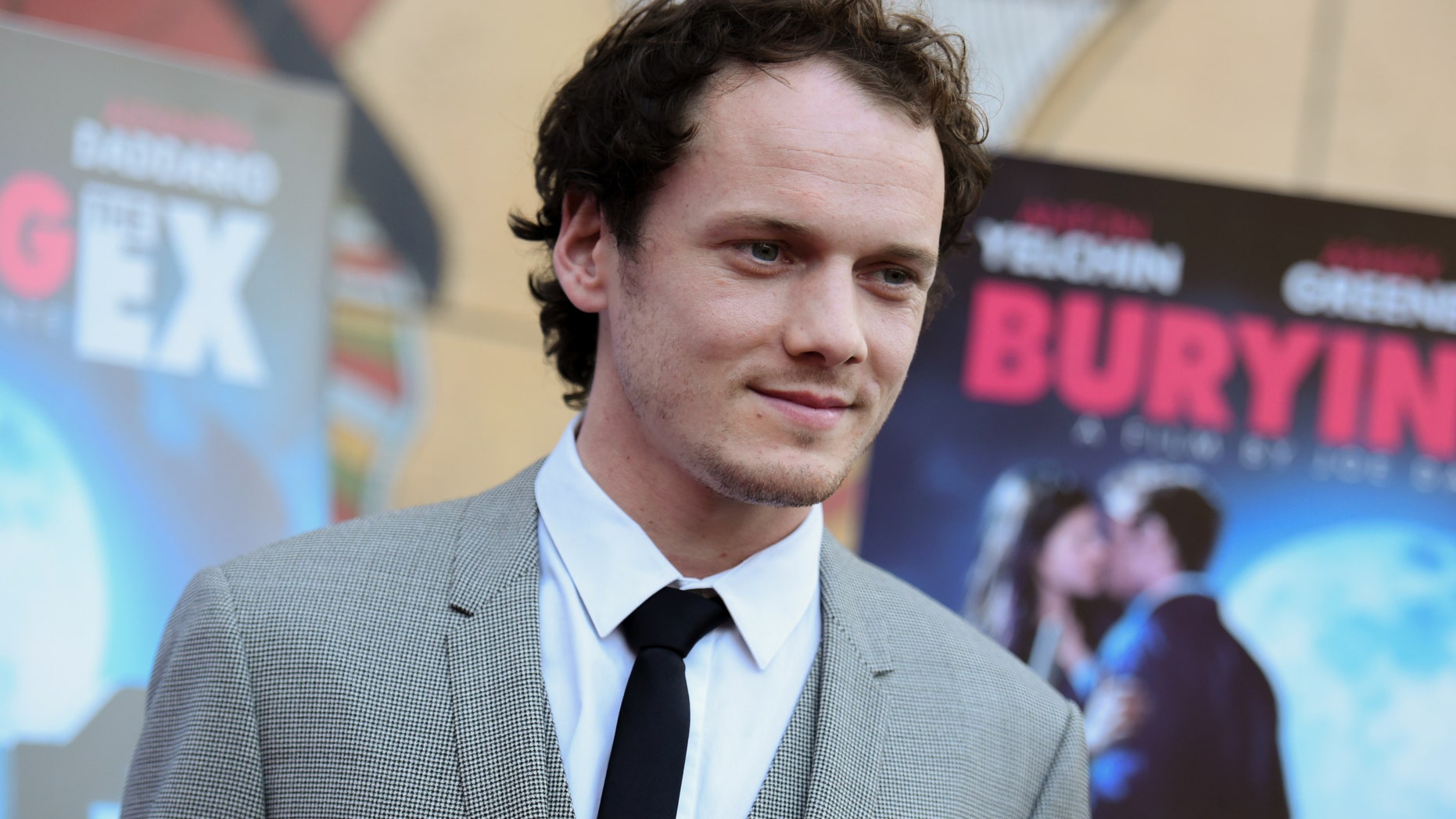FILE - In this June 11, 2015, file photo, Anton Yelchin arrives at a special screening of "Burying the Ex" held at Grauman's Egyptian Theatre in Los Angeles. Yelchin, a charismatic and rising actor best known for playing Chekov in the new "Star Trek" films, has died at the age of 27. He was killed in a fatal traffic collision early Sunday morning, June 19, 2016, his publicist confirmed. (Photo by Richard Shotwell/Invision/AP, File)
