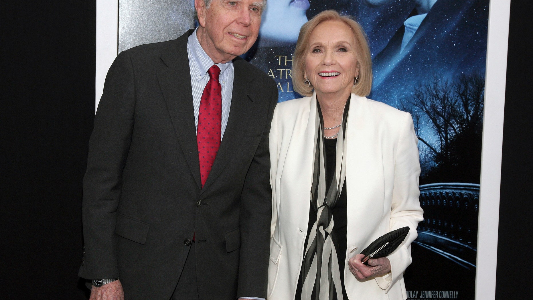 FILE - In this Feb. 11, 2014 file photo, actress Eva Marie Saint, right, poses with her husband, writer/director/producer Jeffrey Hayden at the world premiere of "Winter's Tale" in New York. Hayden died at his Los Angeles home on Dec. 24, 2016. He was 90. (Photo by Andy Kropa/Invision/AP, File)