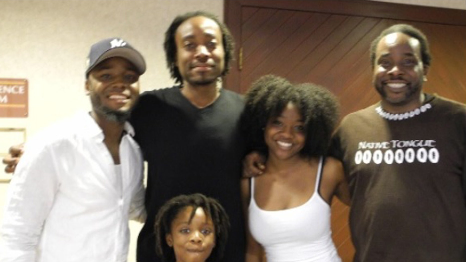 Okera Ras (far right) and son Duro Akil (second from the left) with family members.