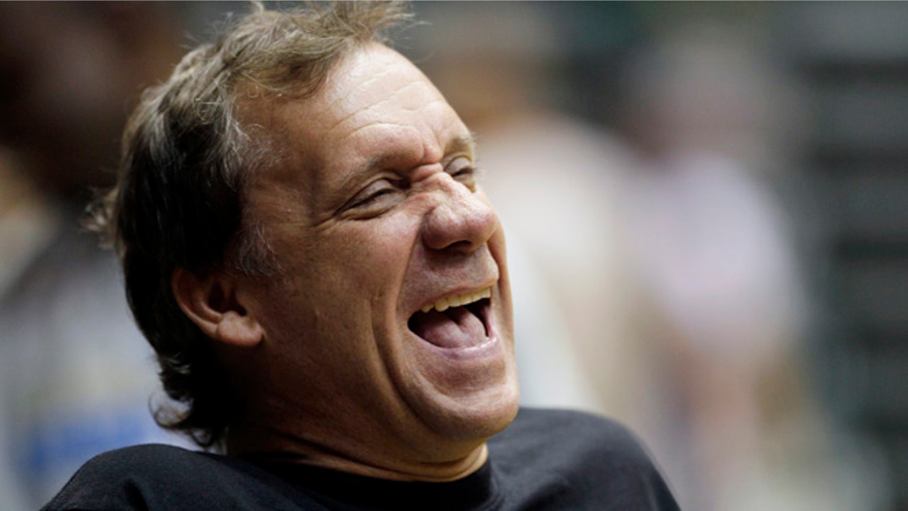 Sept. 29, 2010: Washington Wizards coach Flip Saunders laughs during NBA basketball training camp at the Patriot Center at George Mason University in Fairfax, Va.