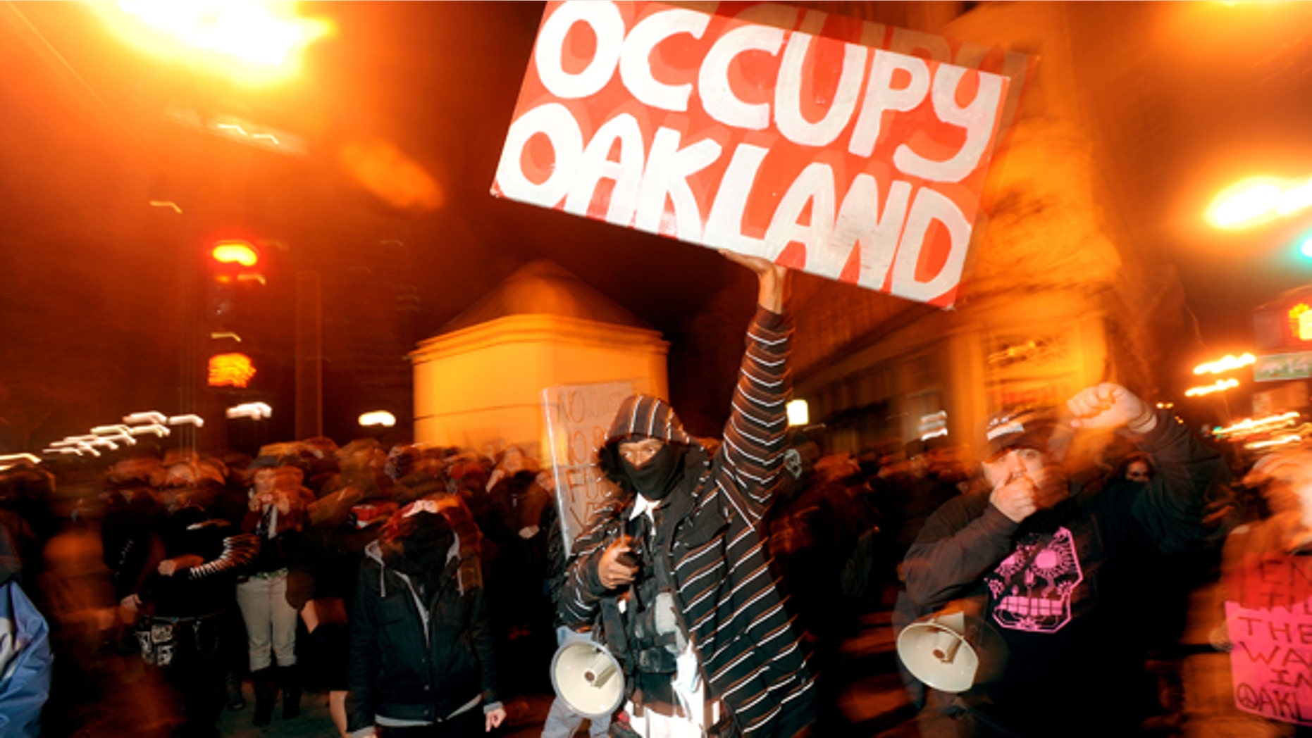 Feb. 4, 2012: Melvin Kelley leads about 75 Occupy Oakland protesters through Oakland, Calif.