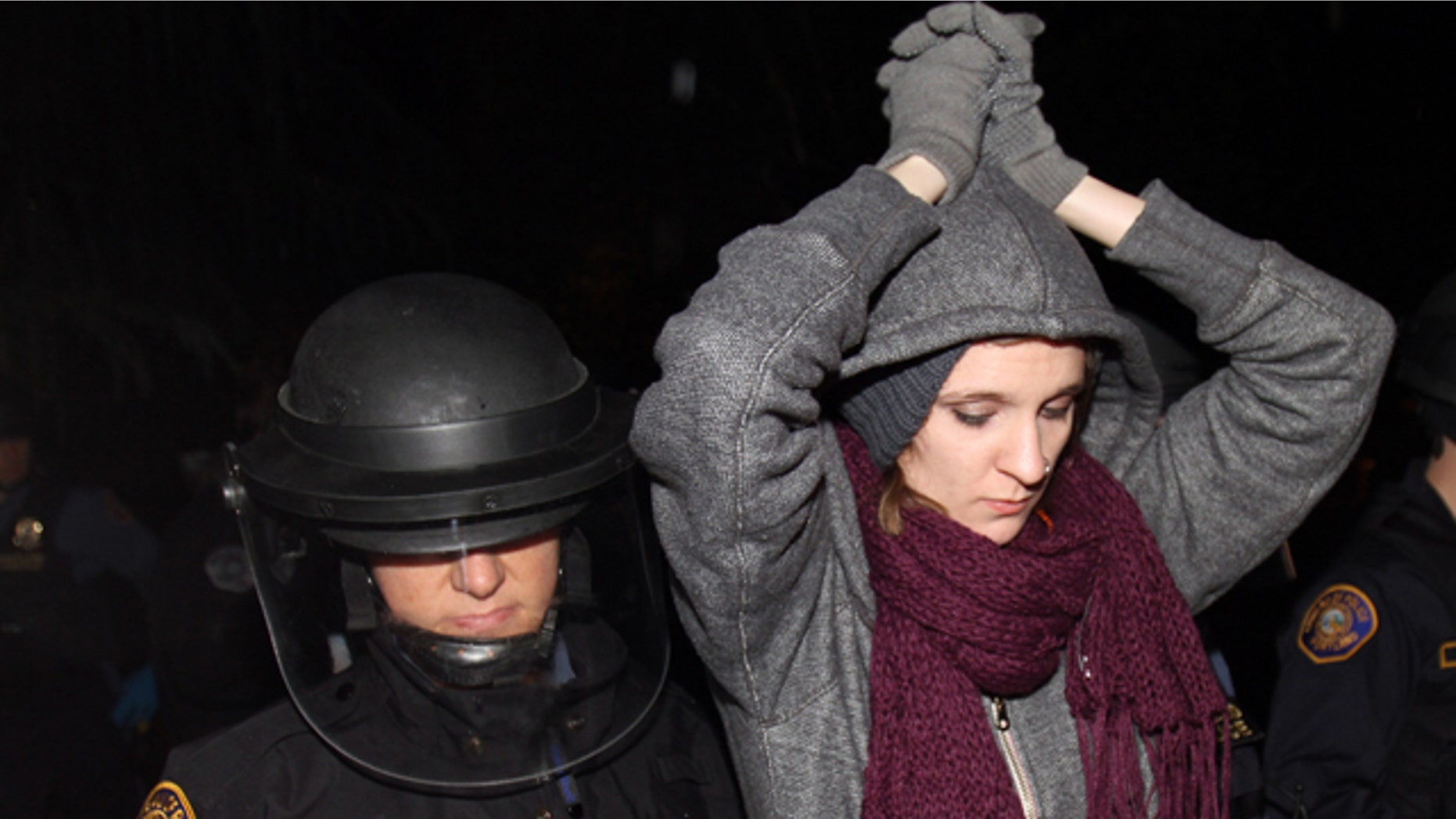 Oct. 30, 2011: A protester is forcibly removed from Jamison Park in Portland, Ore.