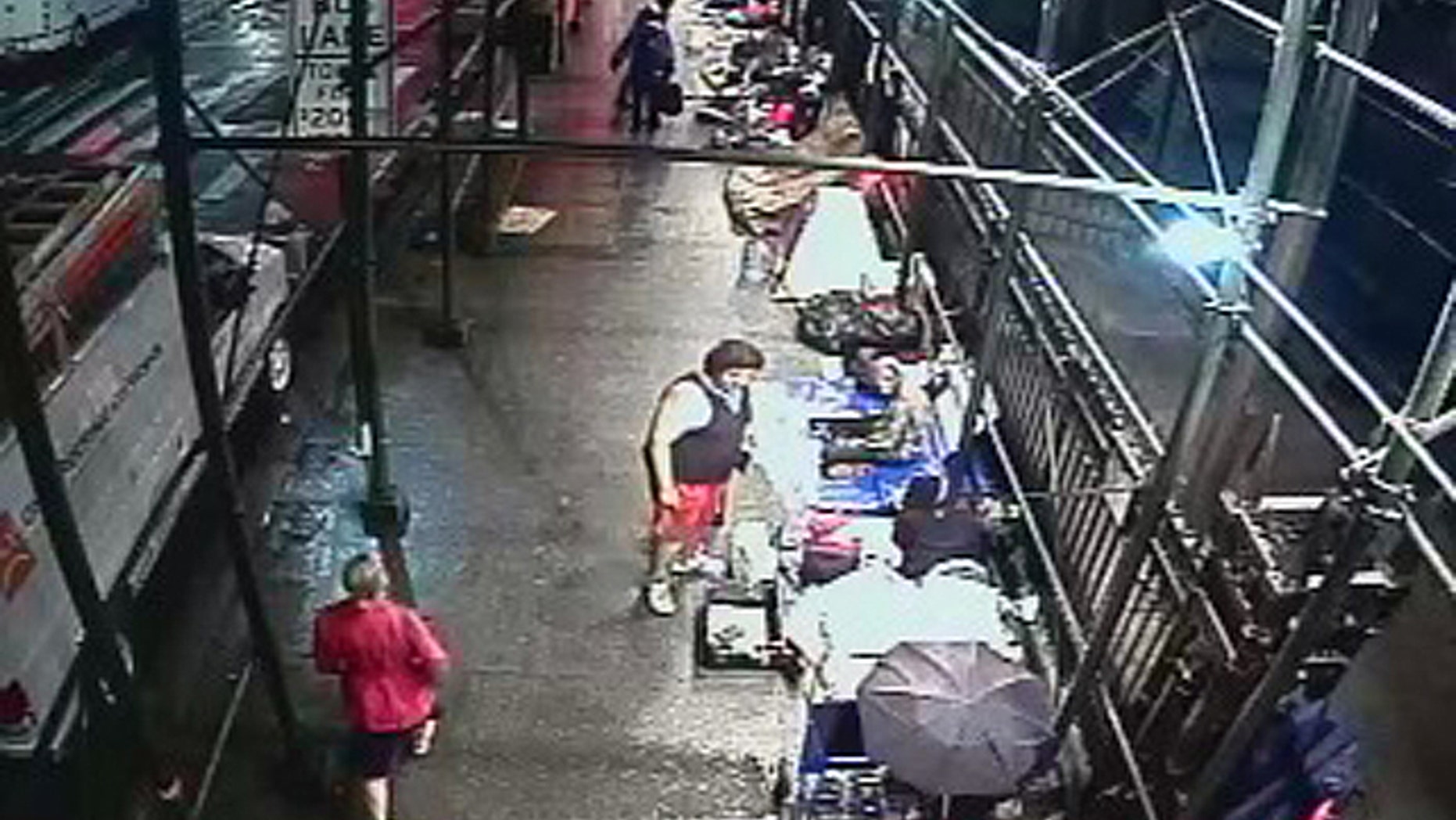 A recent surveillance image shows a number of people camped outside Trinity Church in Lower Manhattan, where church officials say the crowd has led to the cancellation of Halloween activities. (Courtesy: Trinity Church)