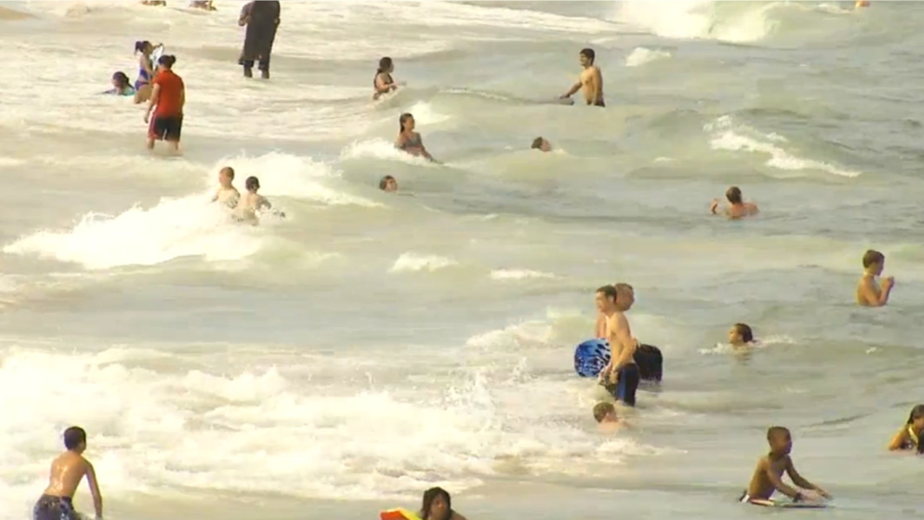 Swimmers in the ocean in Ocean City, Maryland.