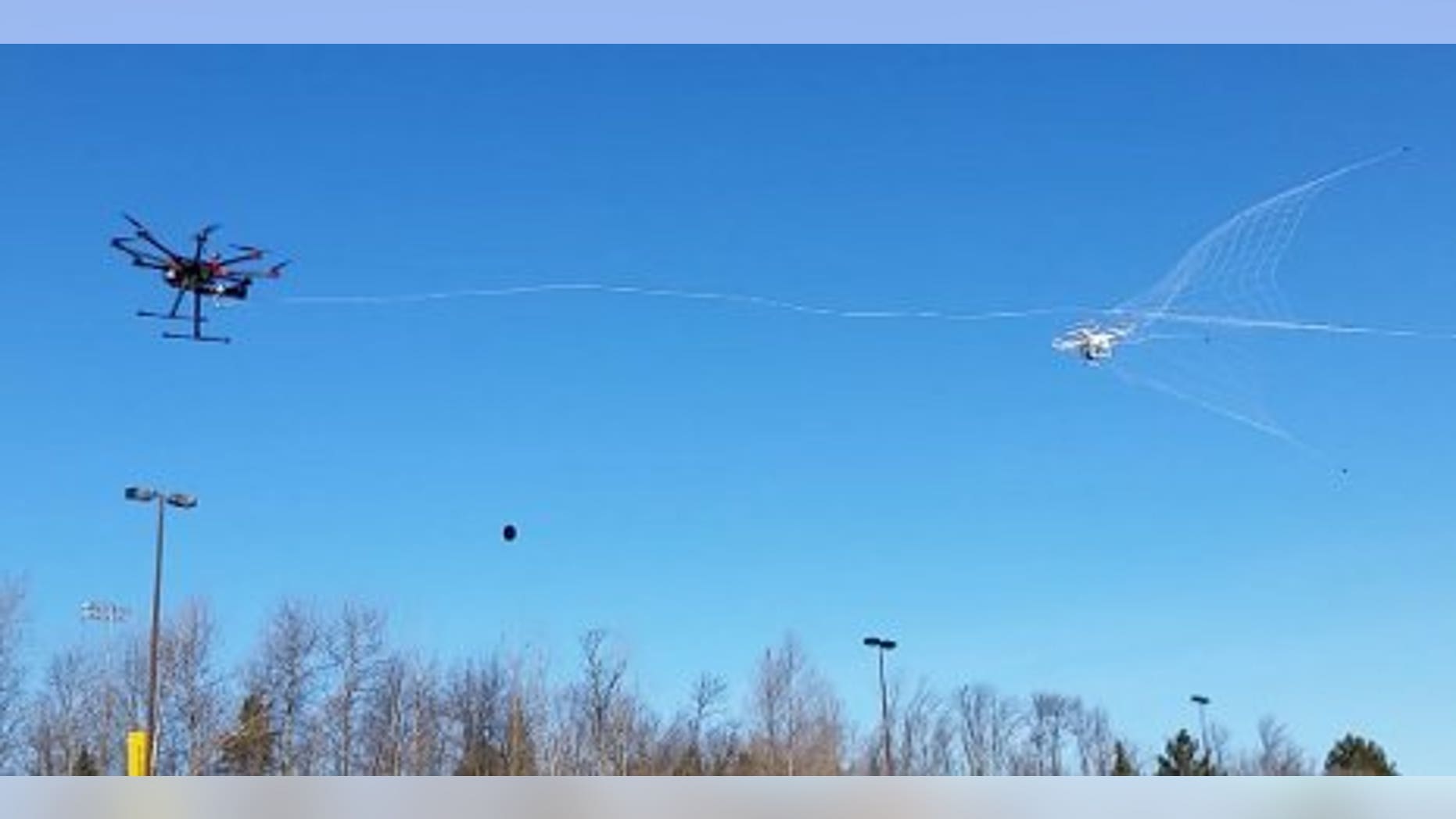 Mo Rastgaar's drone catcher speeds toward its target drone (Michigan Tech University).
