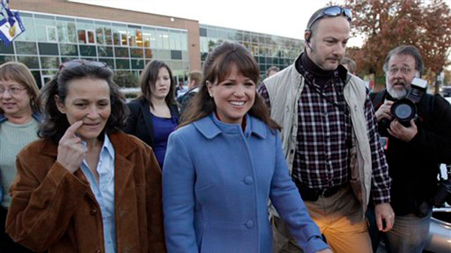 Delaware Republican Senate candidate Christine O'Donnell walks with her sister Jennie O'Donnell, left, after voting Nov. 2 in Wilmington, Del. (AP Photo)