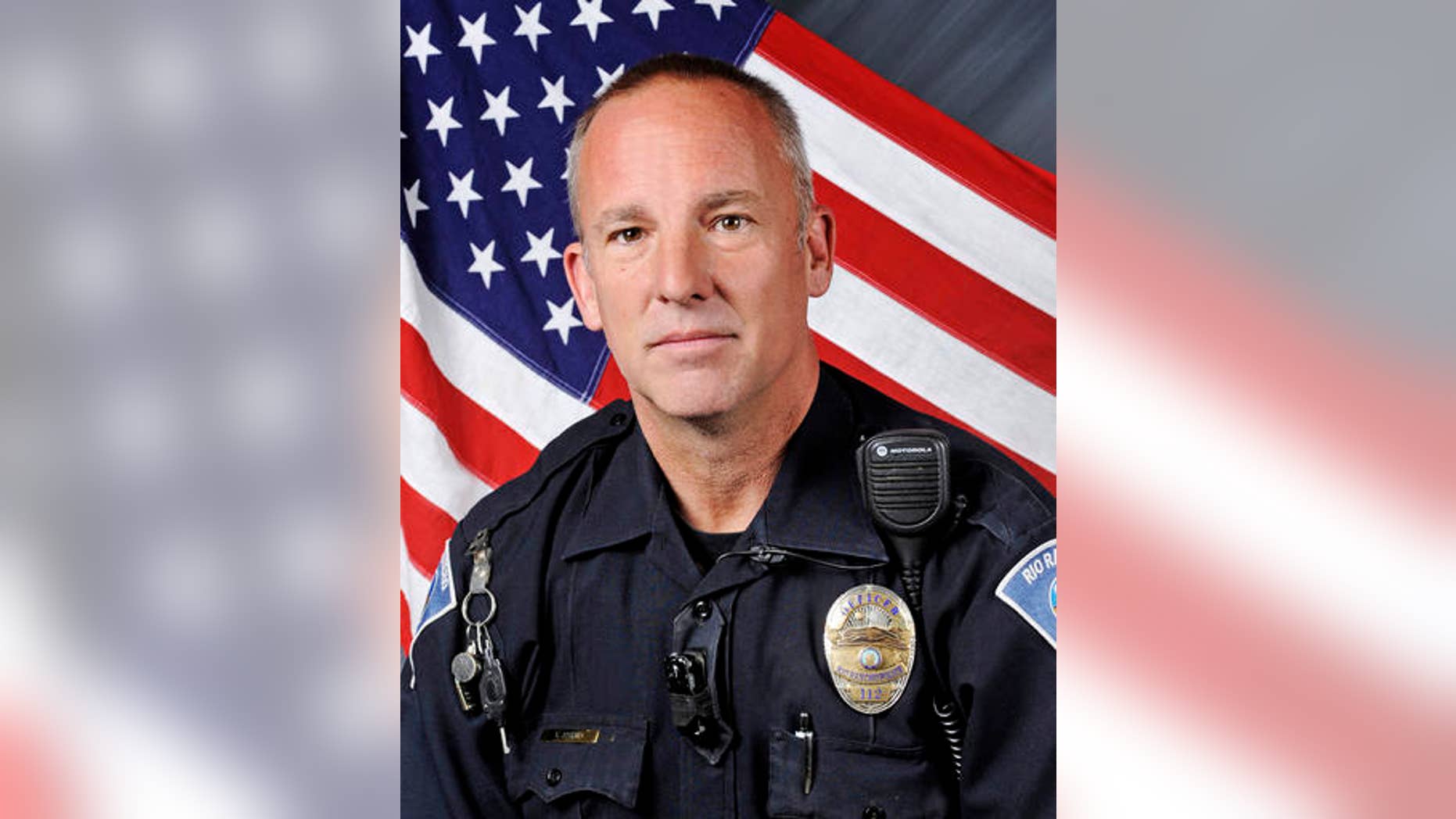 FILE - This undated file photo provided by the Rio Rancho, N.M., Police Department shows Officer Gregg "Nigel" Benner, who was shot and killed during a traffic stop in Rio Rancho, N.M., in May, 2015. Andrew Romero was convicted Friday, Sept. 23, 2016, in the shooting death of the suburban Albuquerque police officer during a chaotic traffic stop. (Rio Rancho Police Department via AP, File)