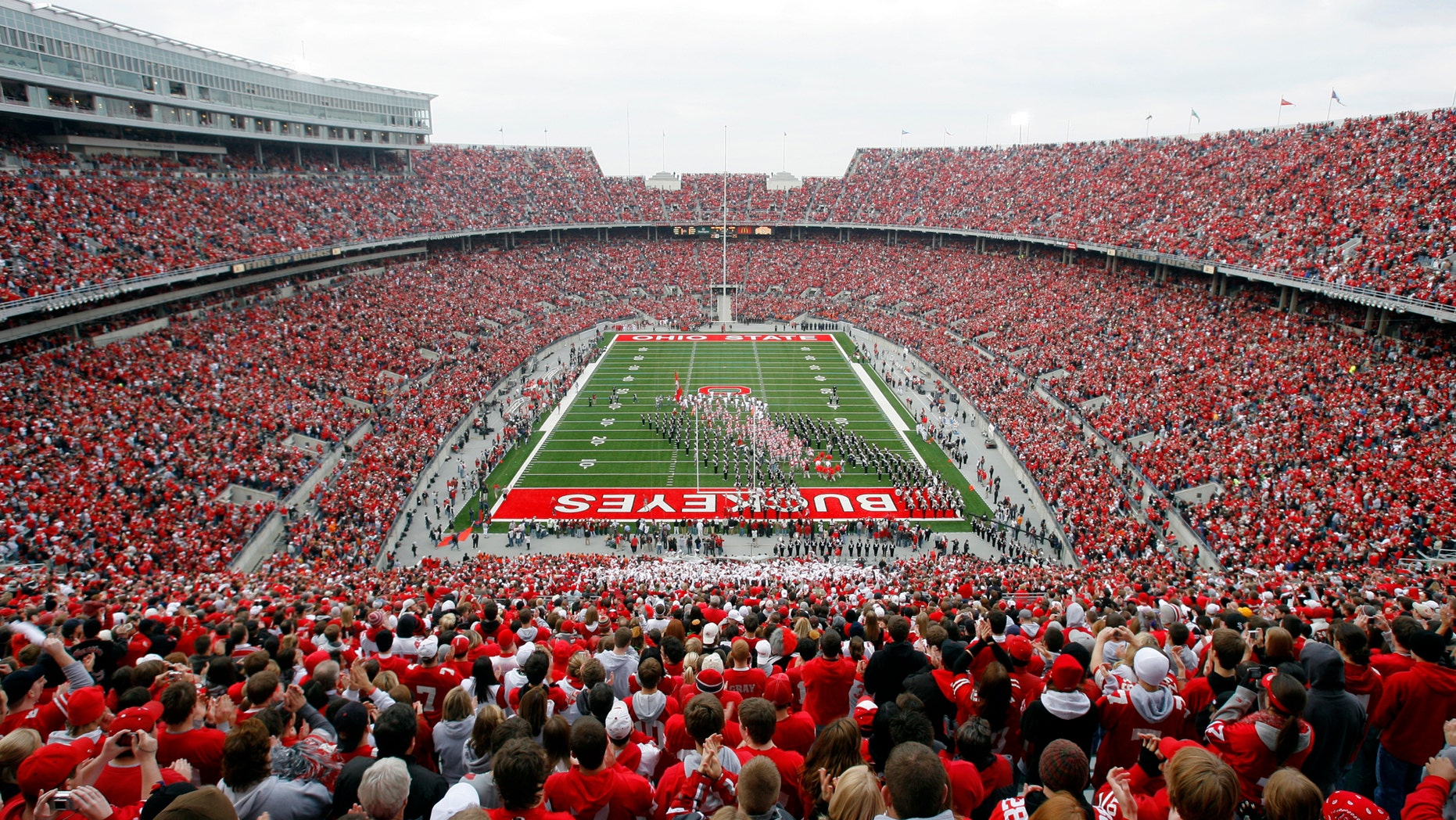 File photo - The Ohio State University football team takes the field prior to the start of their NCAA football game against the University of Illinois in Columbus, Ohio, Nov. 10, 2007. (REUTERS/Matt Sullivan)