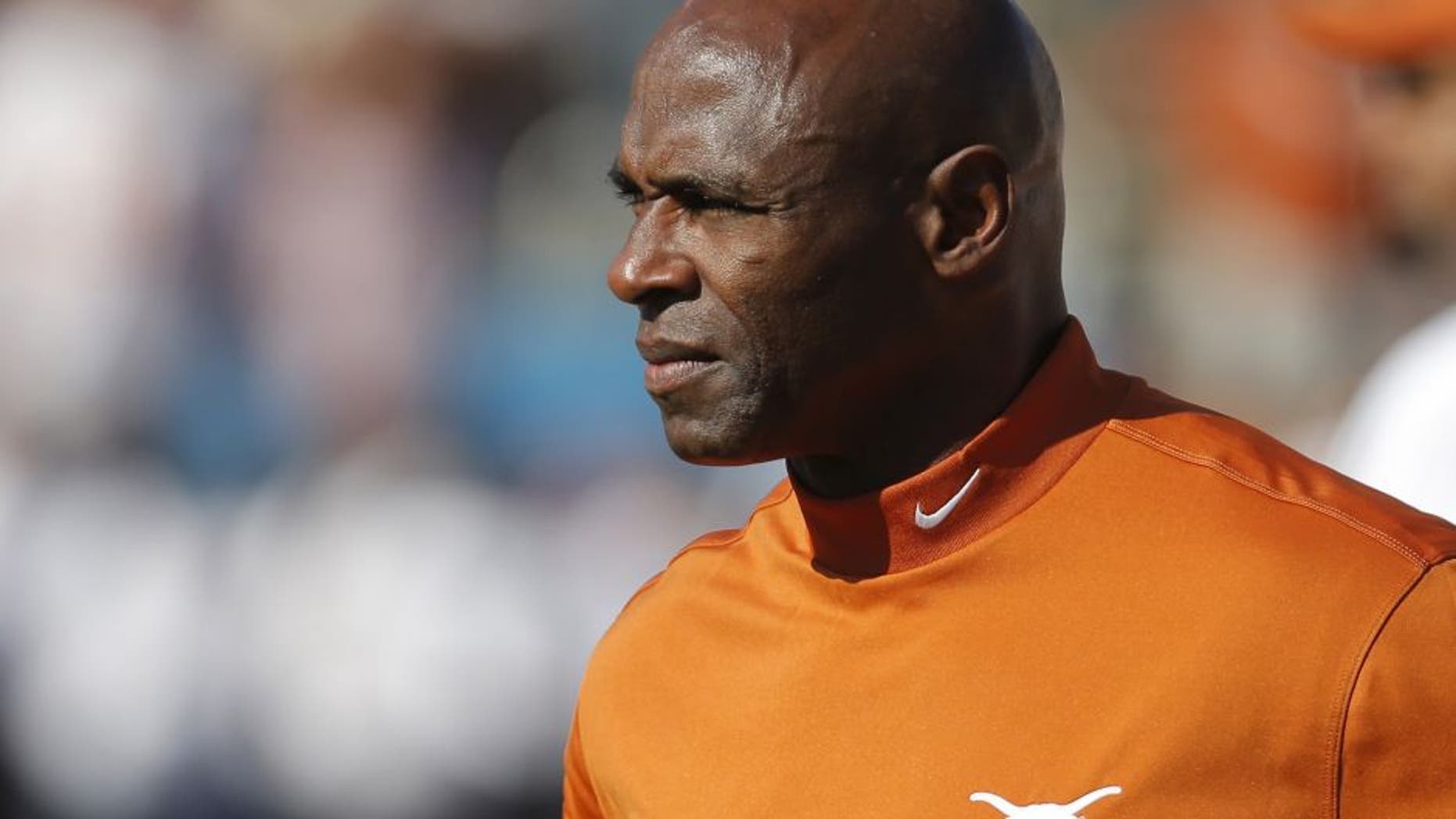 Texas head coach Charlie Strong looks on during warmups before the first half against Oklahoma at the Cotton Bowl in Dallas on Saturday, Oct. 10, 2015. (Brandon Wade/Fort Worth Star-Telegram/TNS via Getty Images)