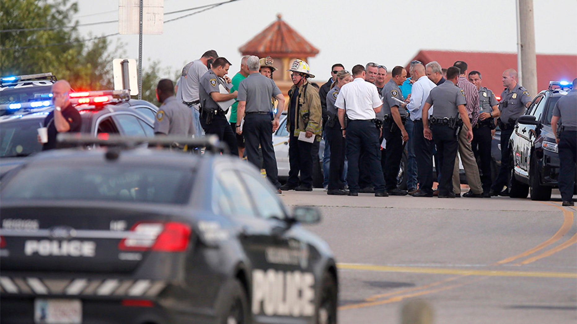 May 24, 2018: Police and emergency personnel surround the scene of the shooting at Lake Hefner in Oklahoma City.