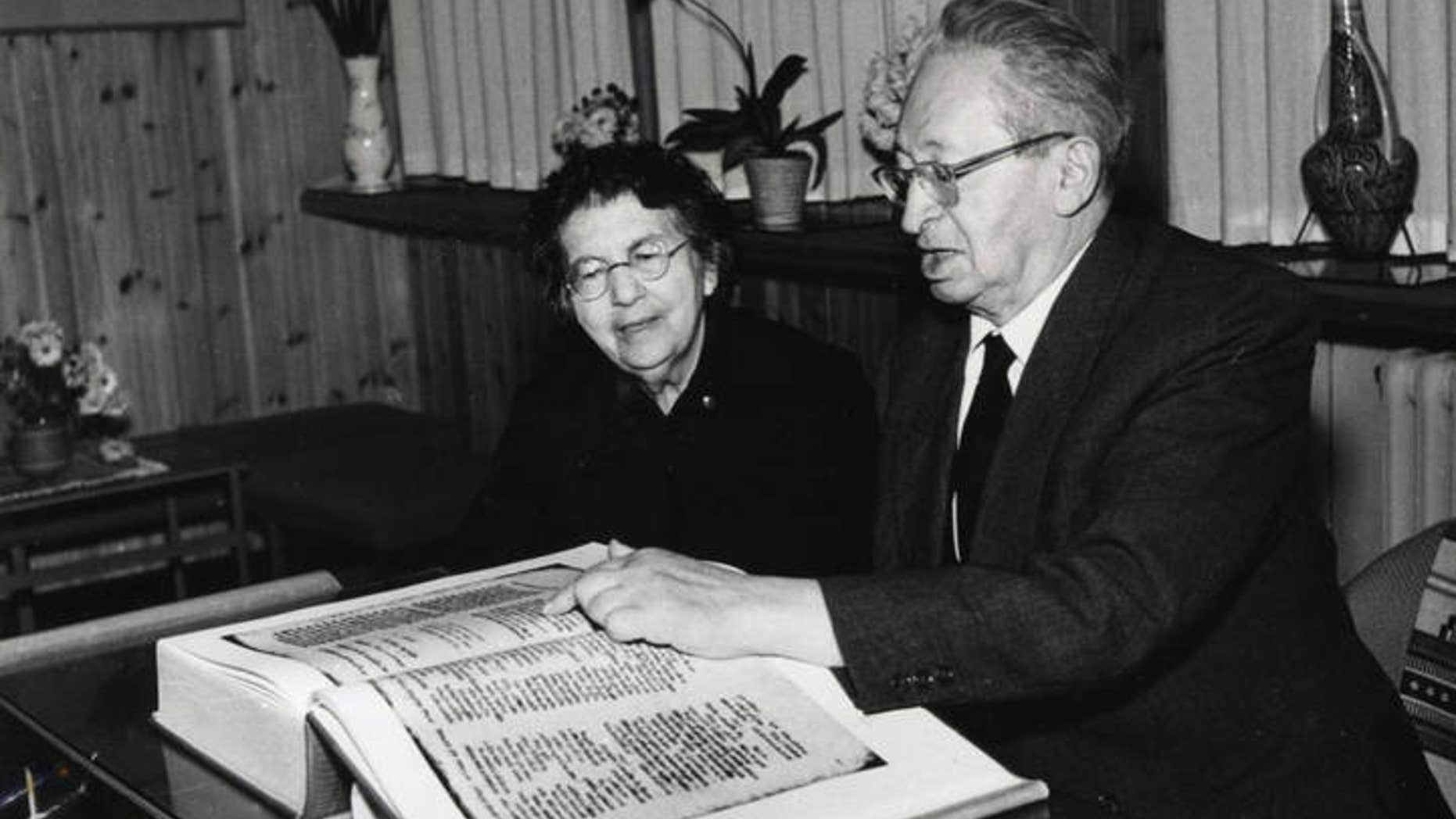 The late president of Israel, Izhak Ben-Zvi, and his wife, Rachel Yanait Ben Zvi, examining a facsimile copy of the Aleppo Codex. (UNESCO)