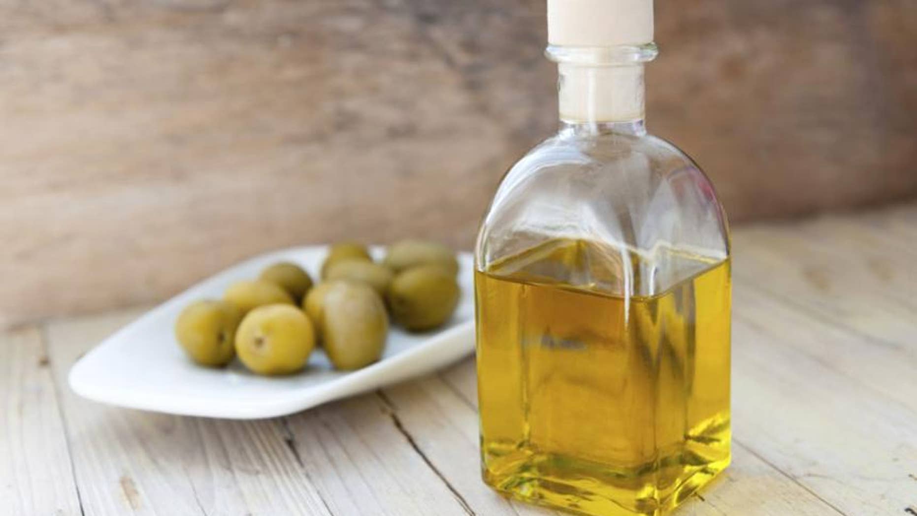 The%20holy%20grail%20of%20monounsaturated%20fat%2C%20EVOO%2C%20is%20literally%20brimming%20with%20health%20boosters%20(and%20that's%20apart%20from%20minimizing%20your%20gut)%2C%20including%20anti-inflammatory%20properties%2C%20cardiovascular%20benefits%2C%20brain-boosting%20benefits%2C%20and%20many%20others.%20Opt%20for%20around%20two%20tablespoons%20a%20day%20%E2%80%94%20an%20easy%20feat%20if%20you%20drizzle%20it%20over%20fresh%20fish%20or%20veggies%2C%20or%20mix%20it%20with%20a%20little%20lemon%20juice%2C%20garlic%20and%20spices%20to%20create%20the%20perfect%20salad%20dressing.%20However%2C%20in%20order%20to%20reap%20the%20benefits%2C%20you%20shouldn%E2%80%99t%20cook%20or%20heat%20up%20olive%20oil%20for%20several%20reasons%2C%20including%20the%20fact%20that%20chemical%20changes%20take%20place%20in%20its%20compound%20and%20could%20be%20harmful%20to%20eat%20and%20breathe.%0A