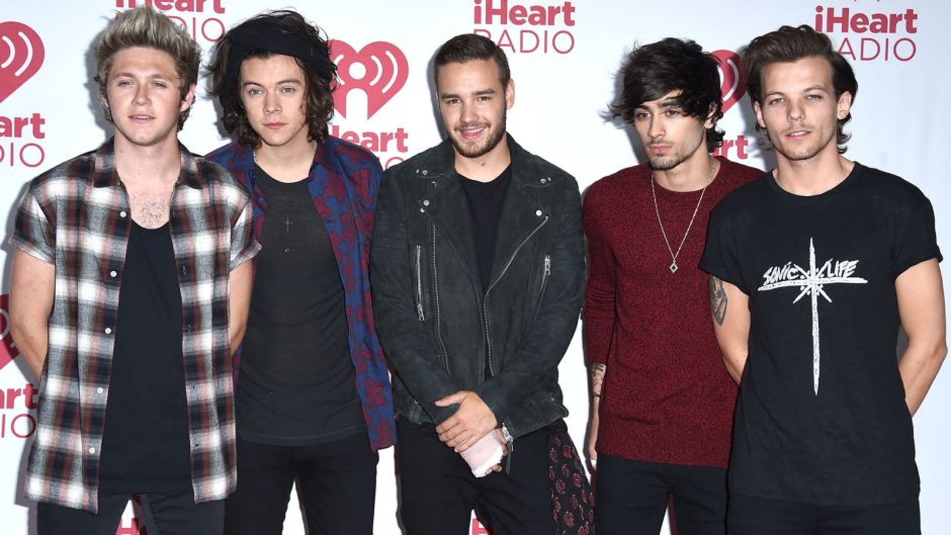 LAS VEGAS, NV - SEPTEMBER 20: One Direction pose in the 2014 iHeartRadio Music Festival - Night 2 - Press Room at MGM Grand Garden Arena on September 20, 2014 in Las Vegas, Nevada. (Photo by Steve Granitz/WireImage)