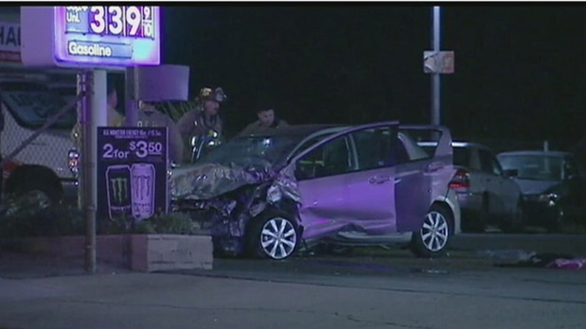 Photo shows car that coroner's office says accelerated uncontrollably and veered off freeway in Ontario, Calif., on New Year's Eve, killing five people. (Fox 11)