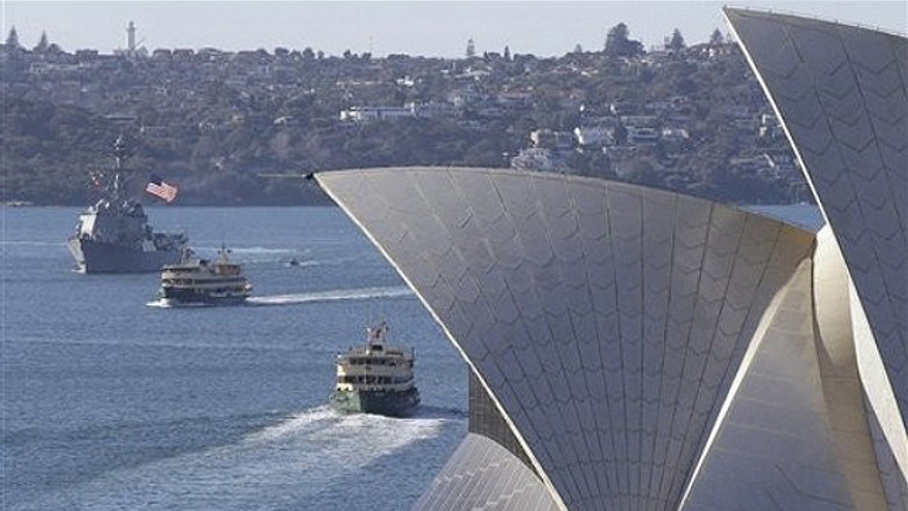 July 4: USS McCampbell sails past the Opera House in Sydney, Australia, on her way to berth alongside at Garden Island Naval base. The McCampbell and USS Fitzgerald arrived in Sydney on the U.S. Independence Day as part of a regular port call ahead of the Talisman Sabre war games to be held off the coast of Queensland later this month.