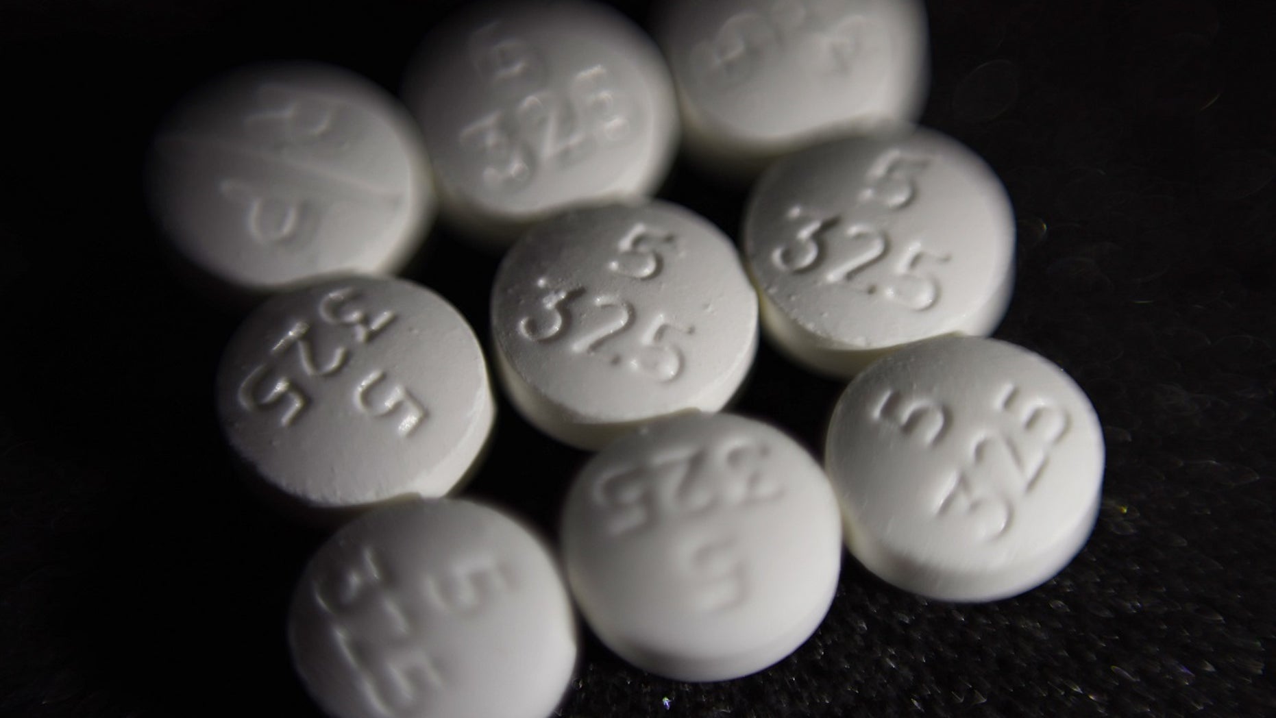 FILE Aug. 15, 2017: An arrangement of pills of the opioid oxycodone-acetaminophen, also known as Percocet, in New York. Cities and counties of all sizes have sued companies that make and distribute prescription opioids. Among the plaintiffs so far: Philadelphia; the state of Ohio; Princeton, West Virginia; the Cherokee Nation; and a consortium of counties across Wisconsin.