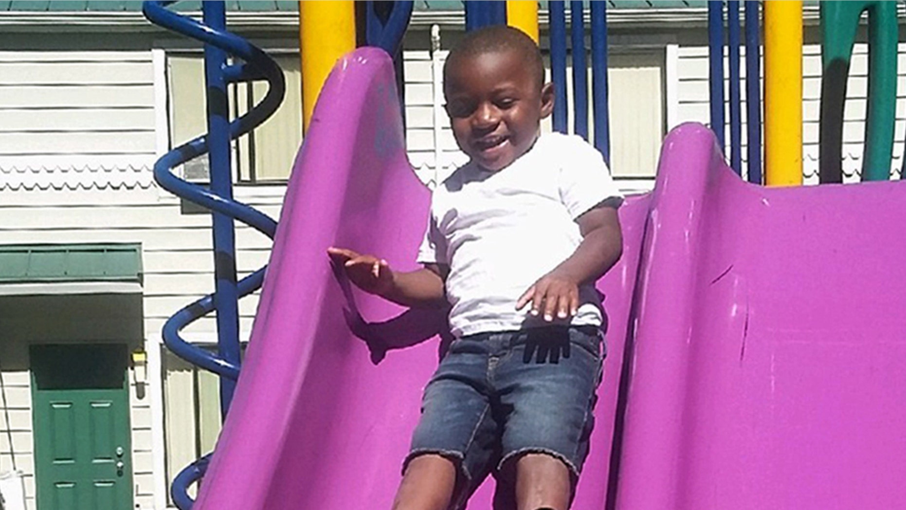 This July 2016 photo provided by Pamela Harris shows Reginald Kendall Harris Jr., playing on a slide at a park in Portland, Ore.