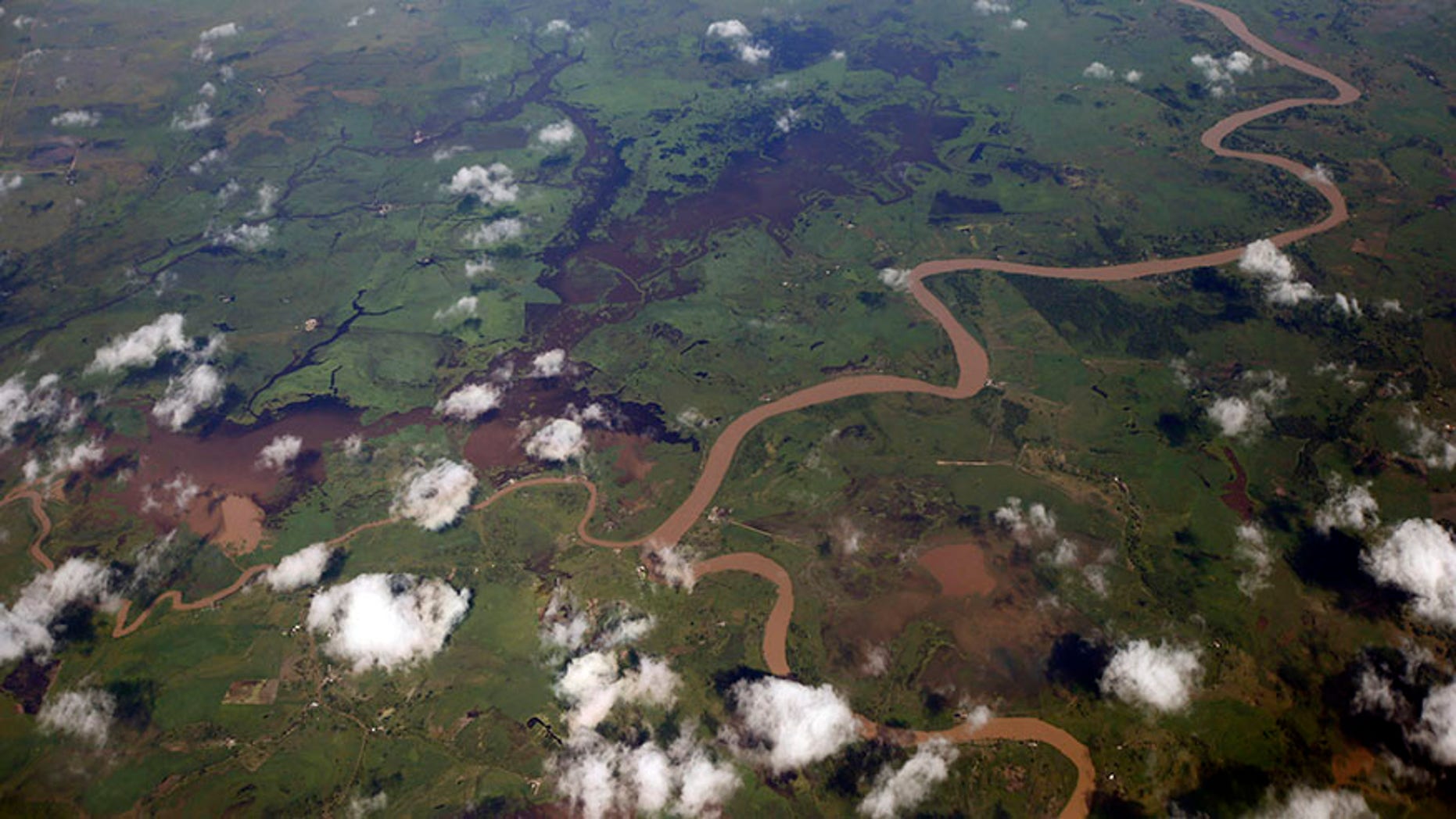 The Orinoco river winds through the jungle near Puerto Ayacucho