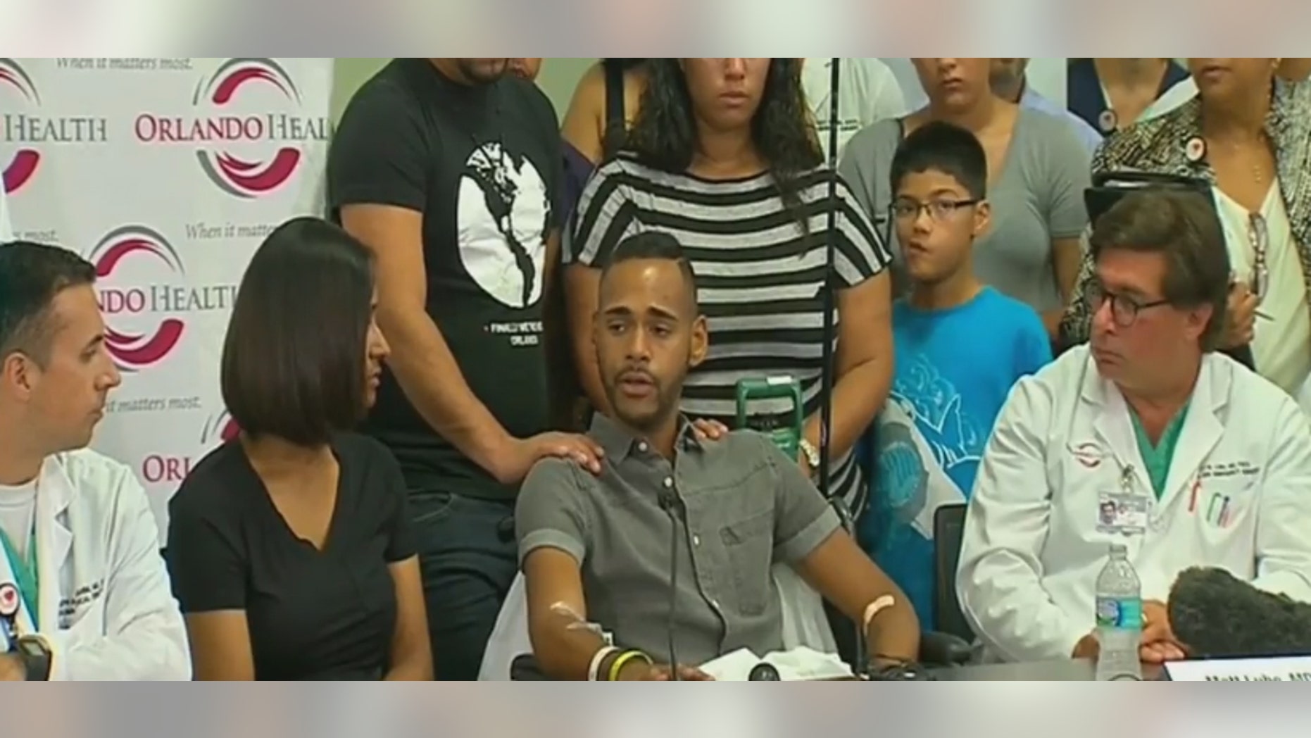 Orlando shooting victim Angel Colon addresses reporters Tuesday.