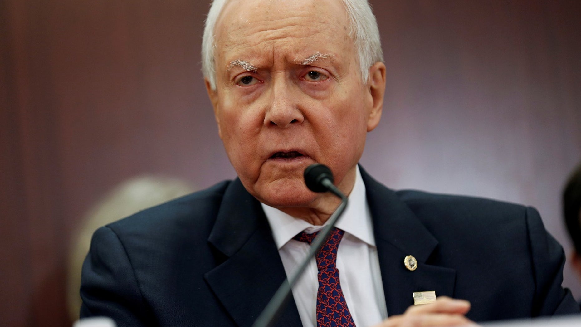 The chairman of the Senate Finance Committee, Orrin Hatch, R-Utah, at a House-Senate conference meeting last month. He will not seek re-election in 2018, he announced.