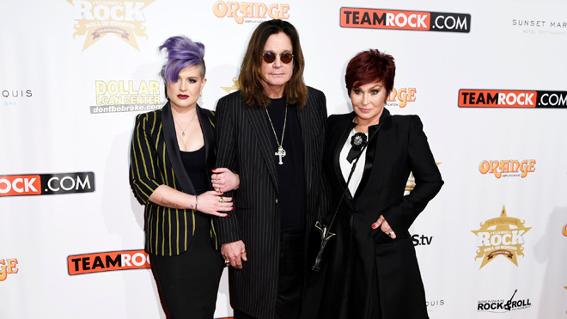 Kelly Osbourne says her parents, Ozzy and Sharon are still together.