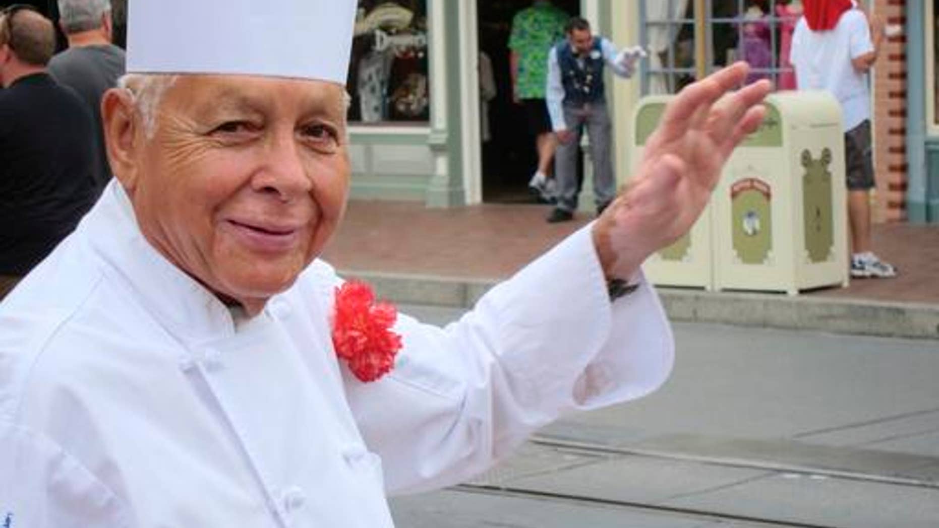 Oscar Martinez greets diners at the Carnation Cafe at Disneyland in Anaheim, Calif. Martinez, 81, is set to celebrate his 60th anniversary at the park this month.