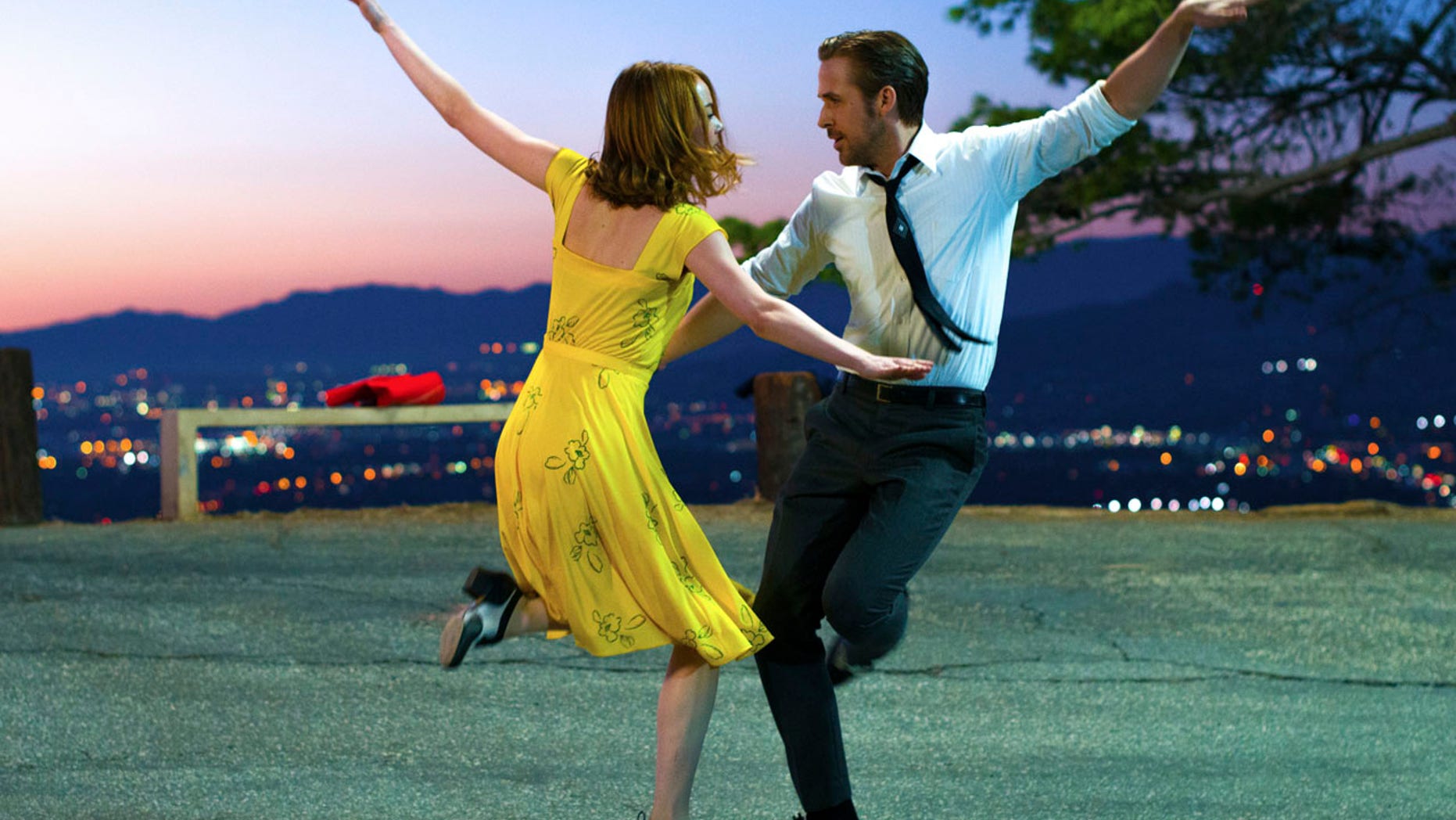 This image released by Lionsgate shows Ryan Gosling, right, and Emma Stone in a scene from, "La La Land." The film was nominated for an Oscar for best picture on Tuesday, Jan. 24, 2017. The 89th Academy Awards will take place on Feb. 26. (Dale Robinette/Lionsgate via AP)