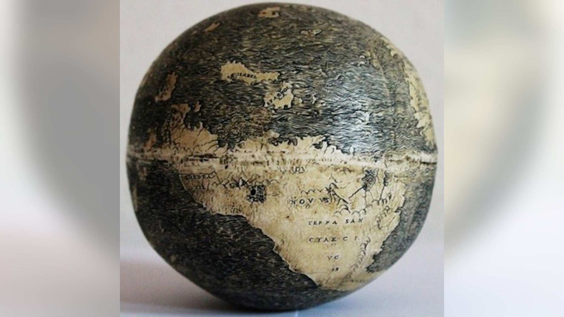 The New World on the ostrich egg globe, which bears three names: "TERRA DE BRAZIL," "MVNDVS NOVVS, and "TERRA SANCTAE CRVCIS."