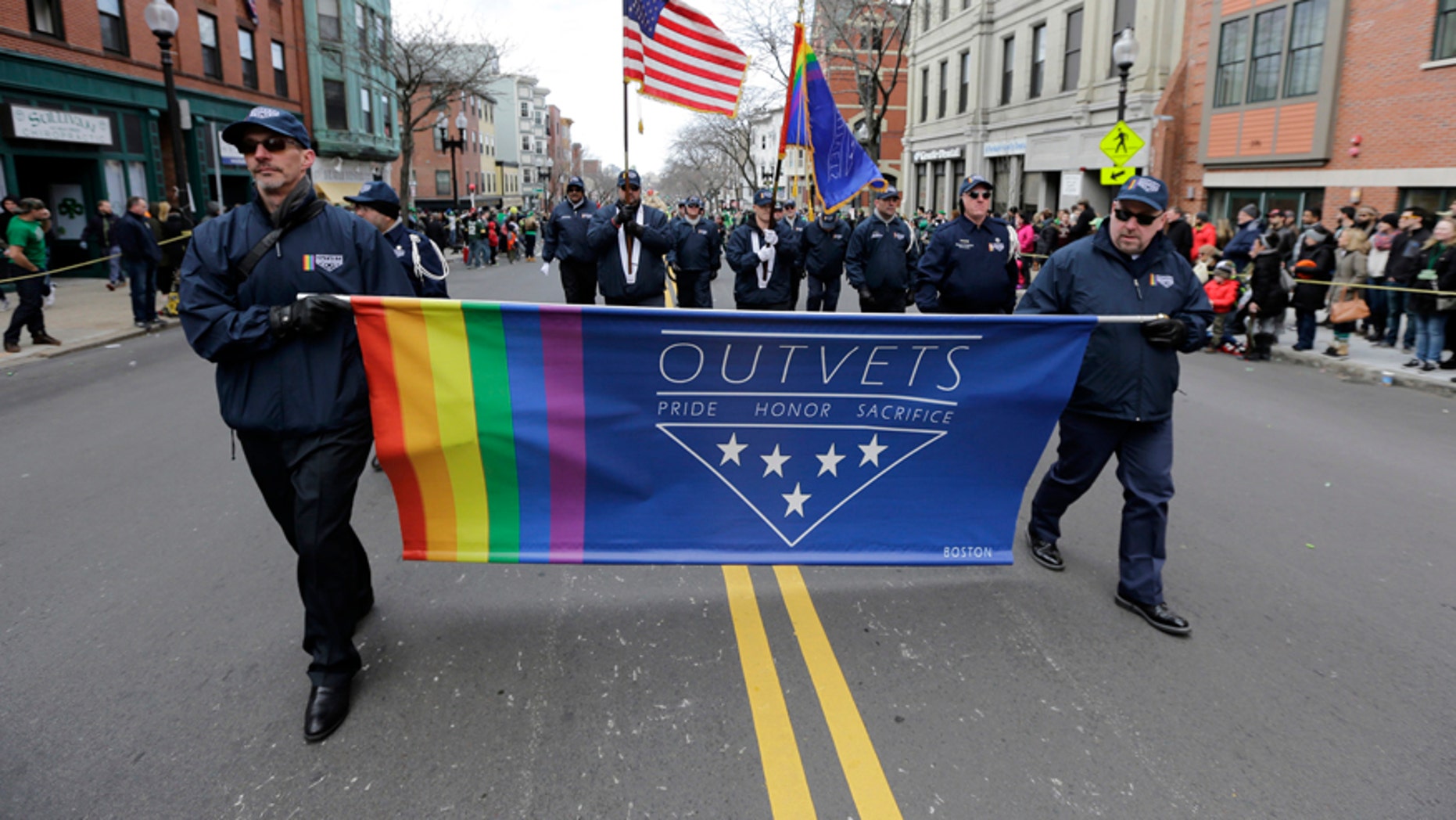 In this March 20, 2016 file photo, members of OutVets, a group of gay military veterans, march in the annual St. Patrick's Day Parade in Boston's South Boston neighborhood. The group said Wednesday, March 8, 2017, it was denied permission to march in the 2017 Boston St. Patrick's Day parade just two years after organizers made the ground-breaking decision to allow gay groups to participate for the first time.