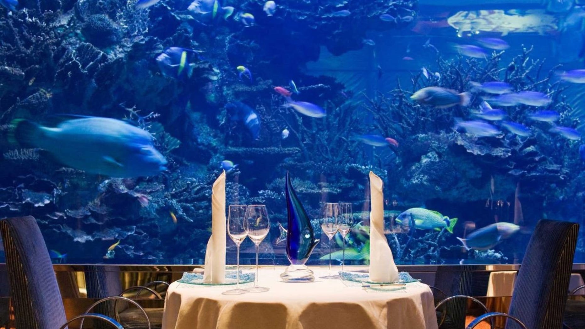 Outlaw's at Al Mahara, at Jumeirah, Burj Al Arab has a floor ceiling aquarium