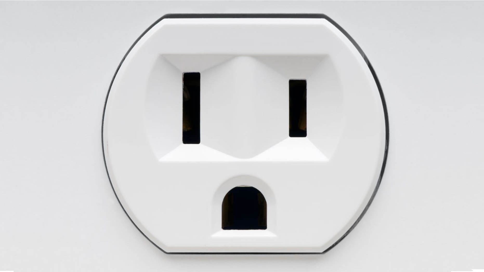 An prankster tricked passengers with a fake outlet sticker.