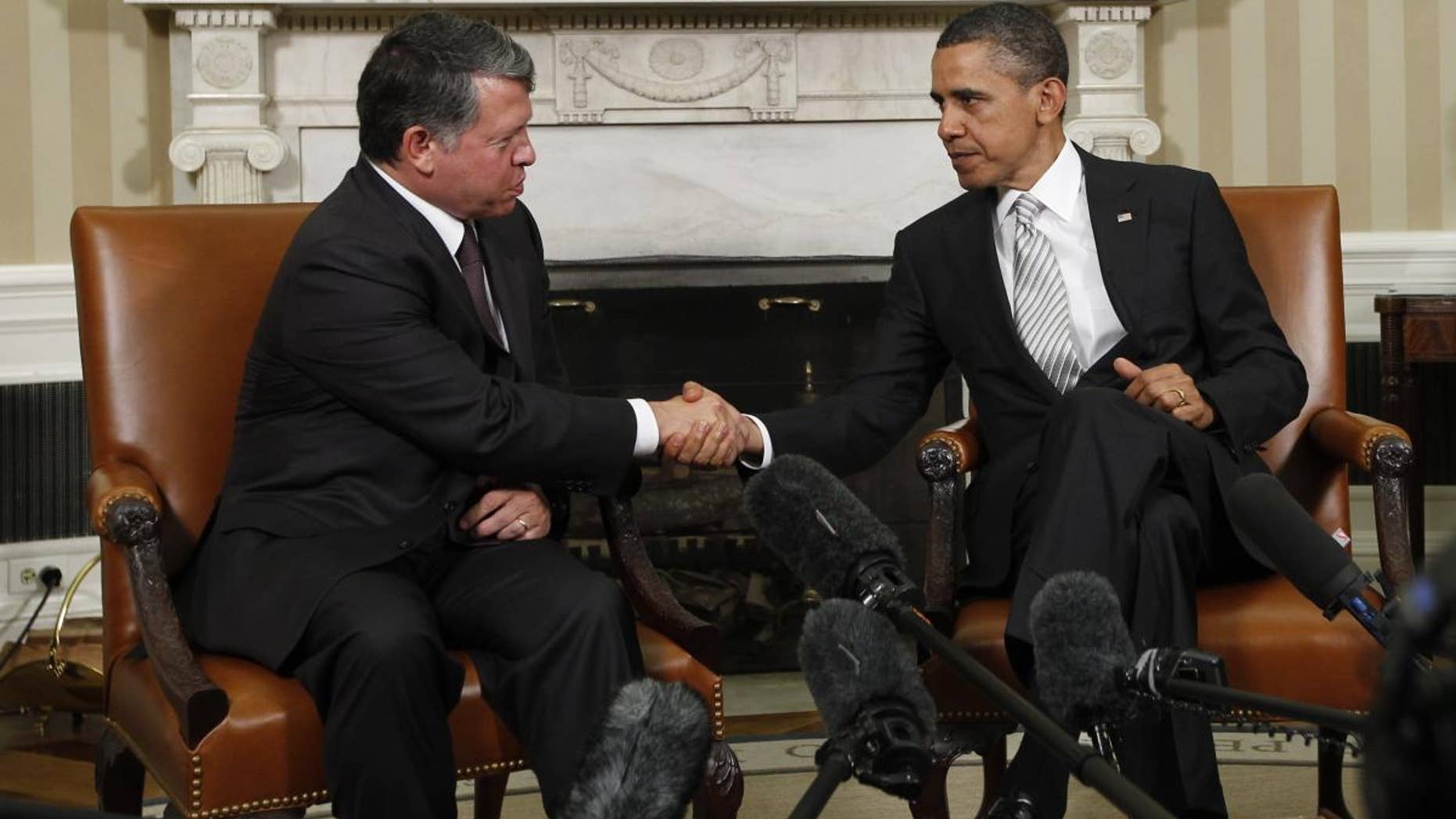 AP image of President Obama and King Abdullah making remarks to the press in the Oval Office.