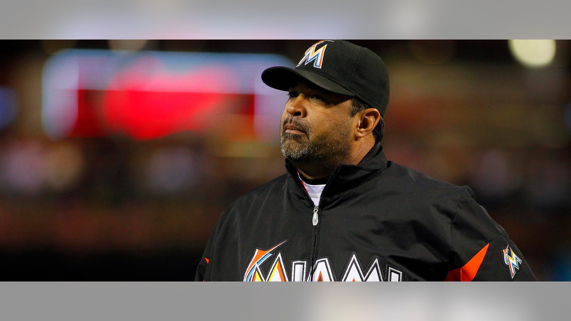 PHILADELPHIA, PA - SEPTEMBER 10: Manager Ozzie Guillen #13 of the Miami Marlins walks back to the dugout during a MLB baseball game against the Philadelphia Phillies on September 10, 2012 at Citizens Bank Park in Philadelphia, Pennsylvania. (Photo by Rich Schultz/Getty Images)