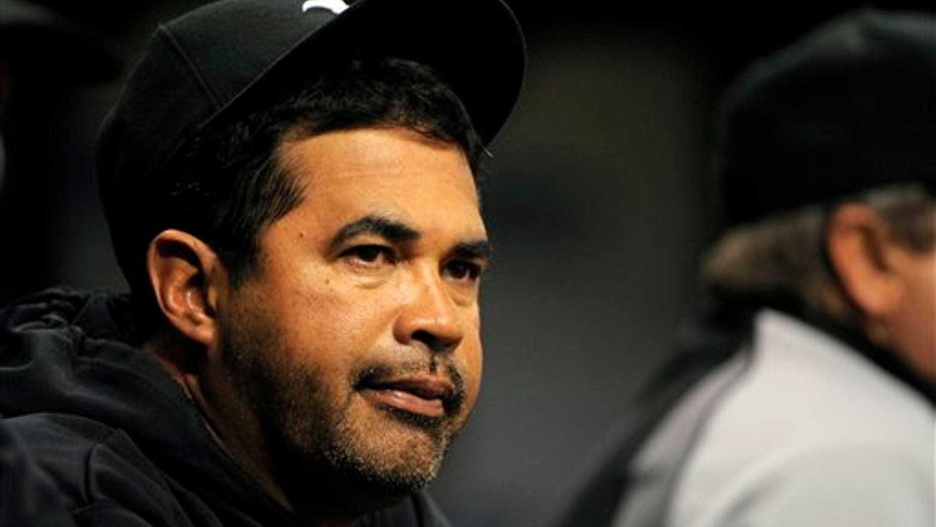 Chicago White Sox manager Ozzie Guillen looks on from the dugout during the final moments of their 4-1 loss to the Tampa Bay Rays during a Major League Baseball game on Wednesday, April 20, 2011, in St. Petersburg, Fla. (AP Photo/Brian Blanco)