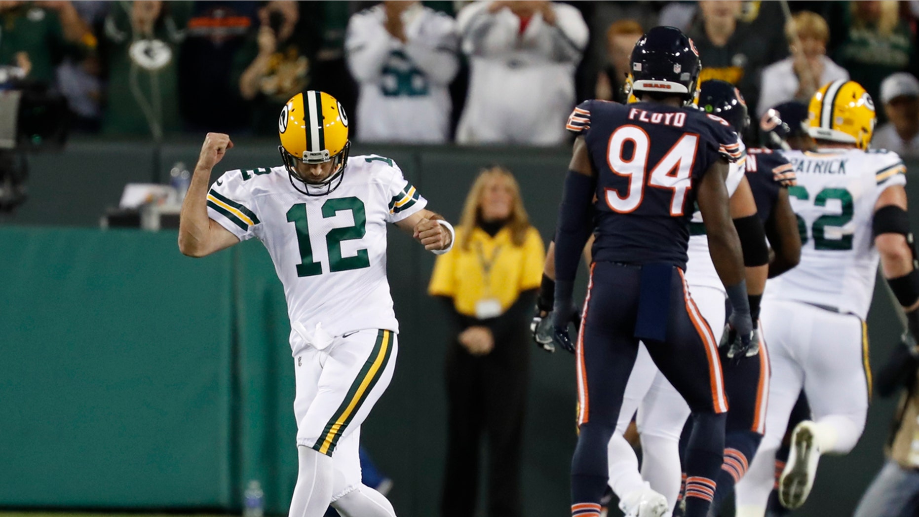 Green Bay Packers' Aaron Rodgers celebrates a touchdown pass during the first half of an NFL football game against the Chicago Bears Thursday, Sept. 28, 2017, in Green Bay, Wis. (AP Photo/Matt Ludtke)