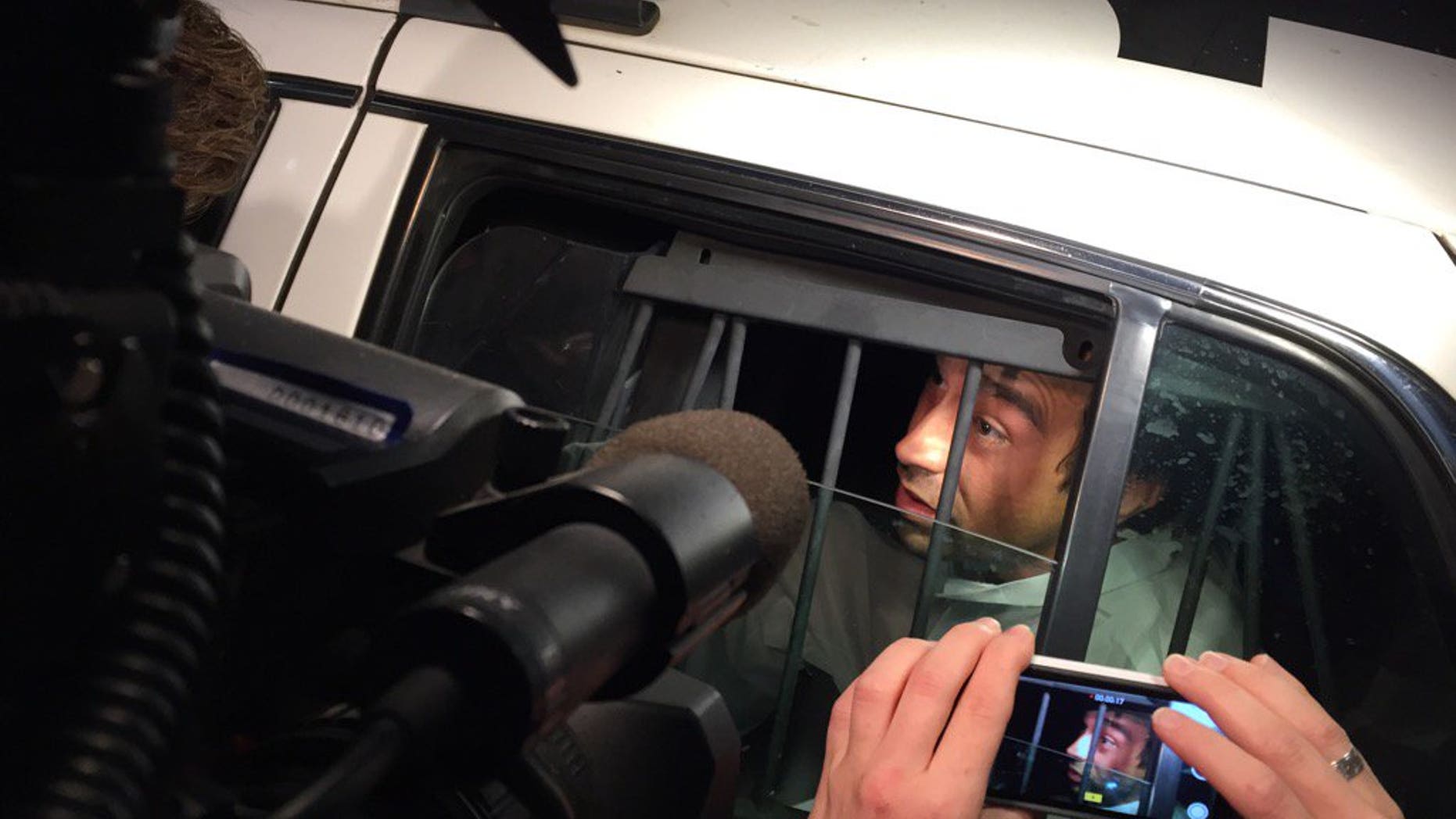 Suspect Anthony Padgett arriving at a jail for booking.