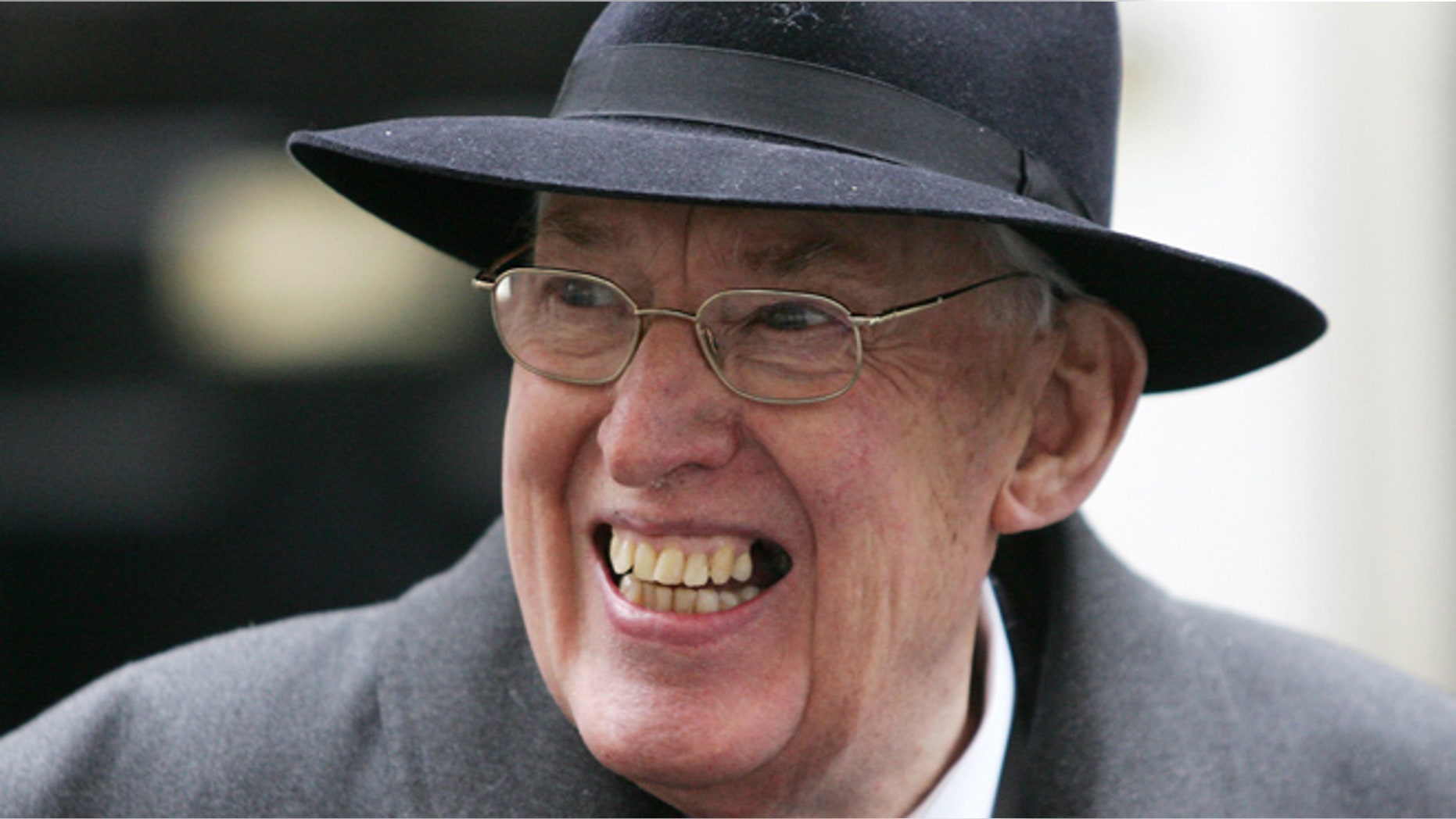 March 22, 2007: Rev. Ian Paisley, Leader of the Democratic Union Party, smiles as he speaks to the press as he leaves 11 Downing Street after a meeting on the Northern Ireland budget with British Chancellor Gordon Brown in London. (AP/Sang Tan, File)