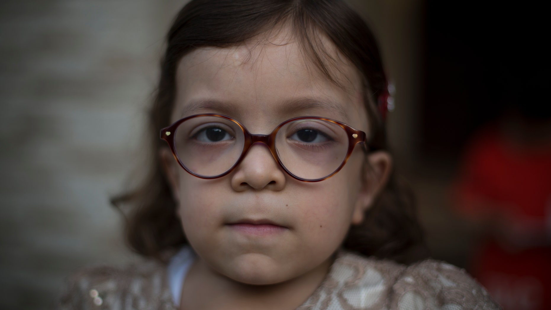 Pakistan's Maria, 6, who is suffering from MPS, poses for a picture in Rawalpindi, Pakistan.