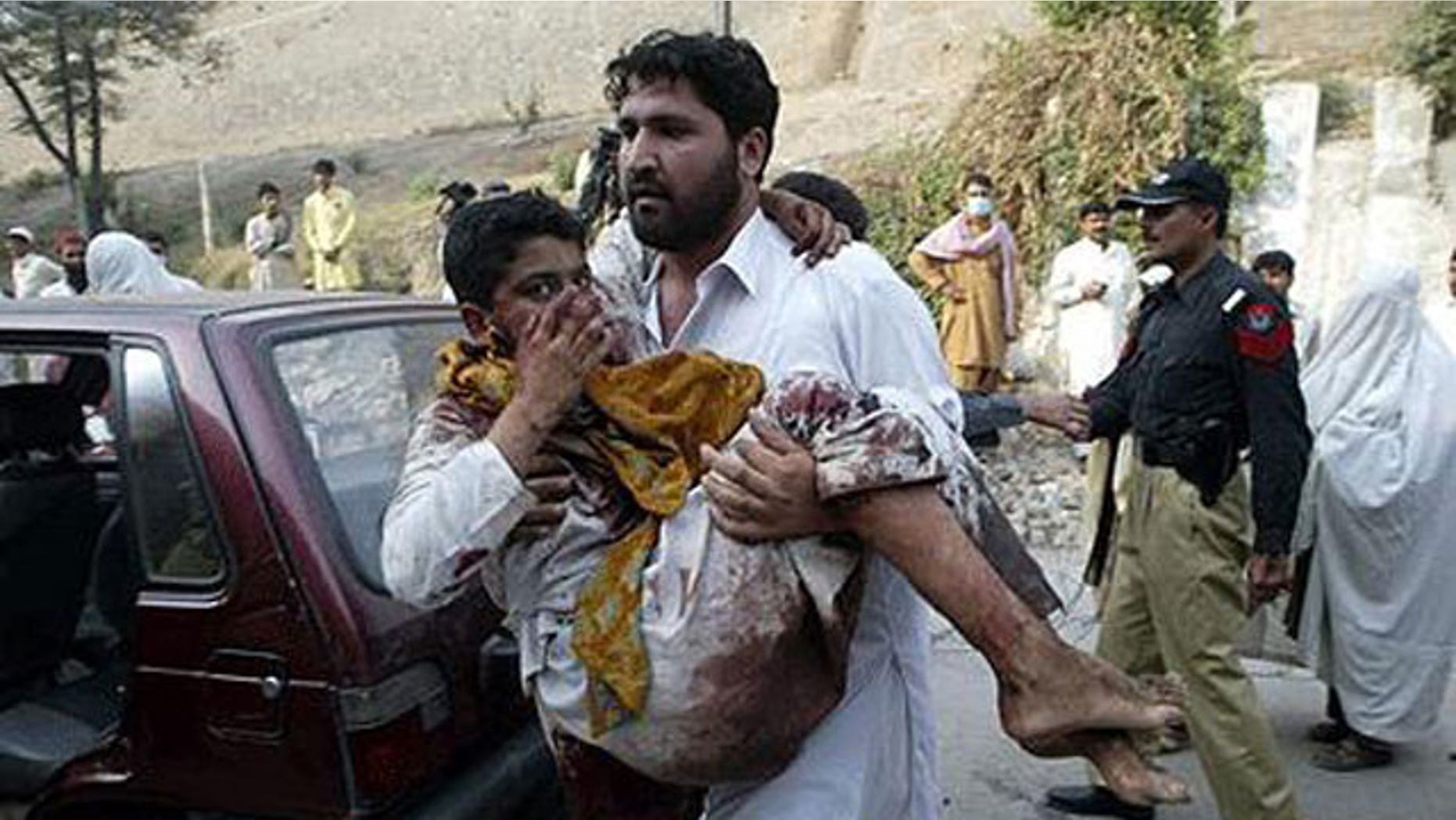 A bomb struck a mosque in northwest Pakistan during prayers Friday, causing the roof to collapse injuring many and killing at least 50 people. The bombing may have targeted an anti-Taliban activist, officials said.