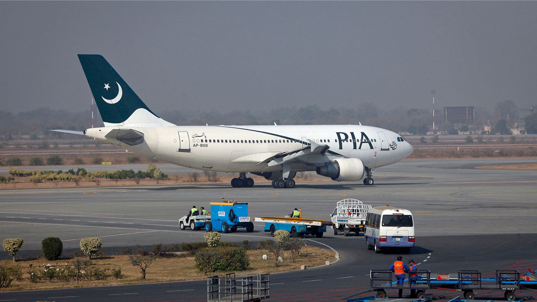 Pakistan International Airlines is blaming the ground crew for the "inconvenience caused" to the grieving families.