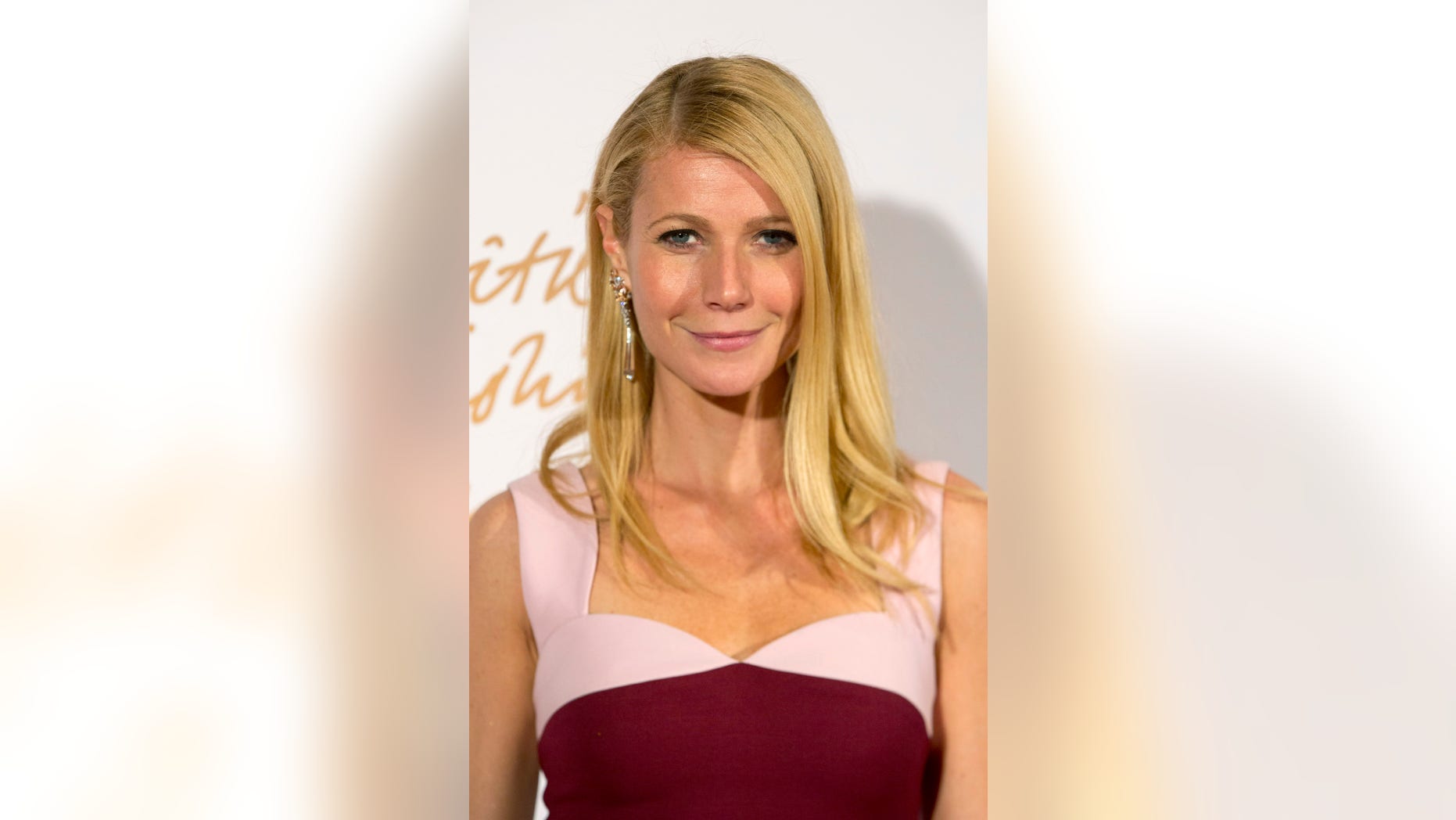 December 2, 2013. Gwyneth Paltrow poses at the British Fashion Awards in London.