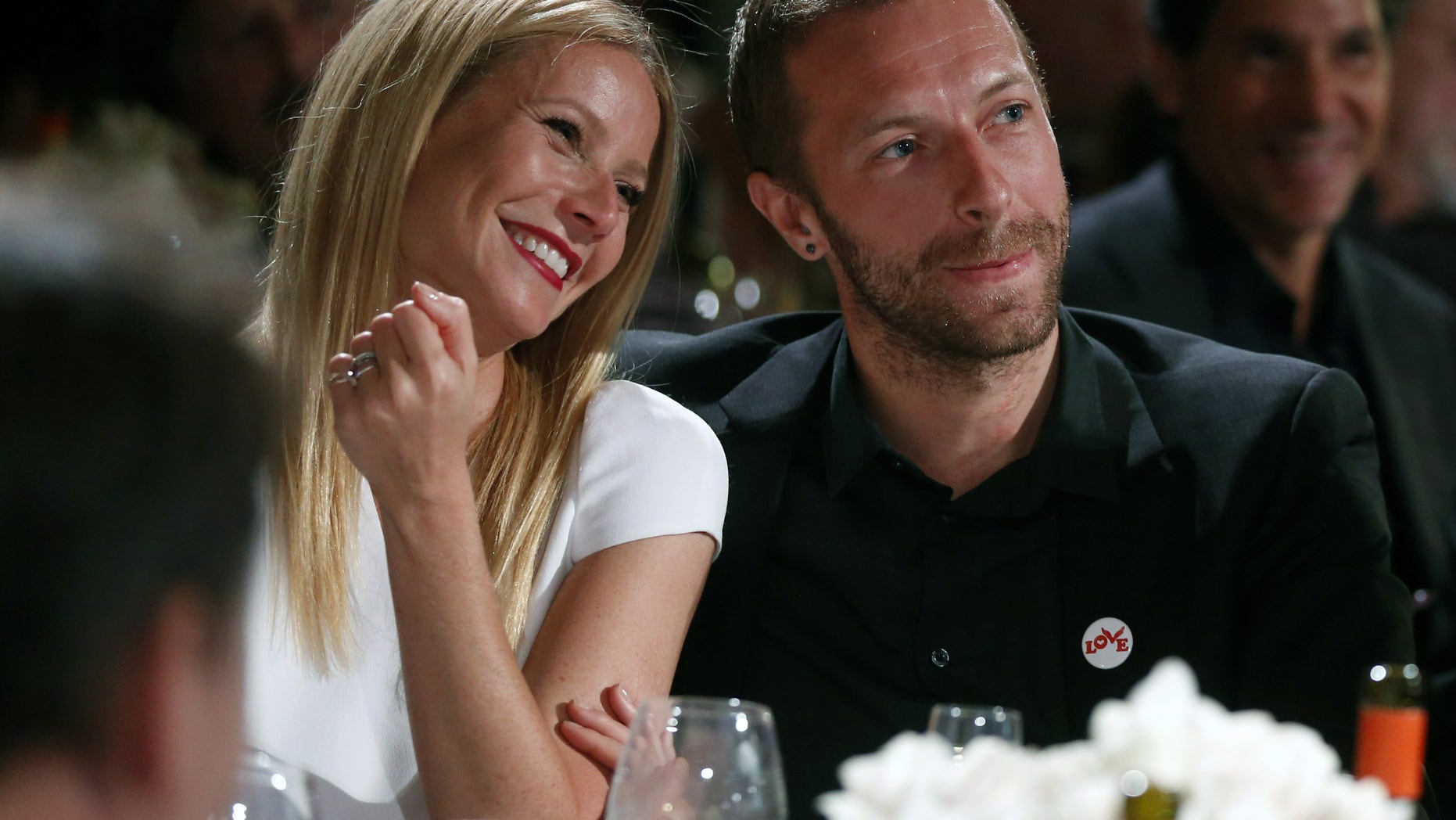 Jan. 11, 2014. Gwyneth Paltrow, left, and her husband, singer Chris Martin at the 3rd Annual Sean Penn & Friends Help Haiti Home Gala in Beverly Hills, Calif.