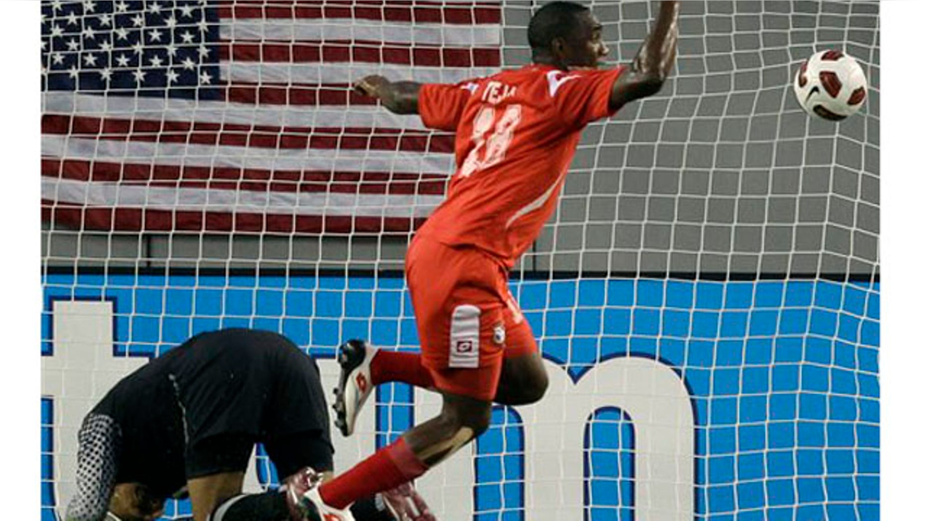 Panama's Luis Tejada (18) celebrates after scoring against United States goalkeeper Tim Howard, left, during the first half of a CONCACAF Gold Cup soccer matchon Saturday, June 11, 2011, in Tampa, Fla. (AP Photo/Chris O'Meara)