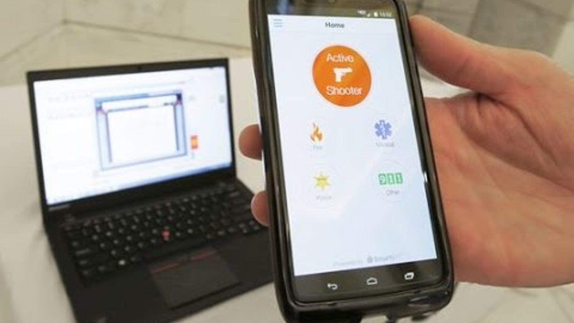 A demonstration of the Rave Panic Button app in Little Rock, Ark.