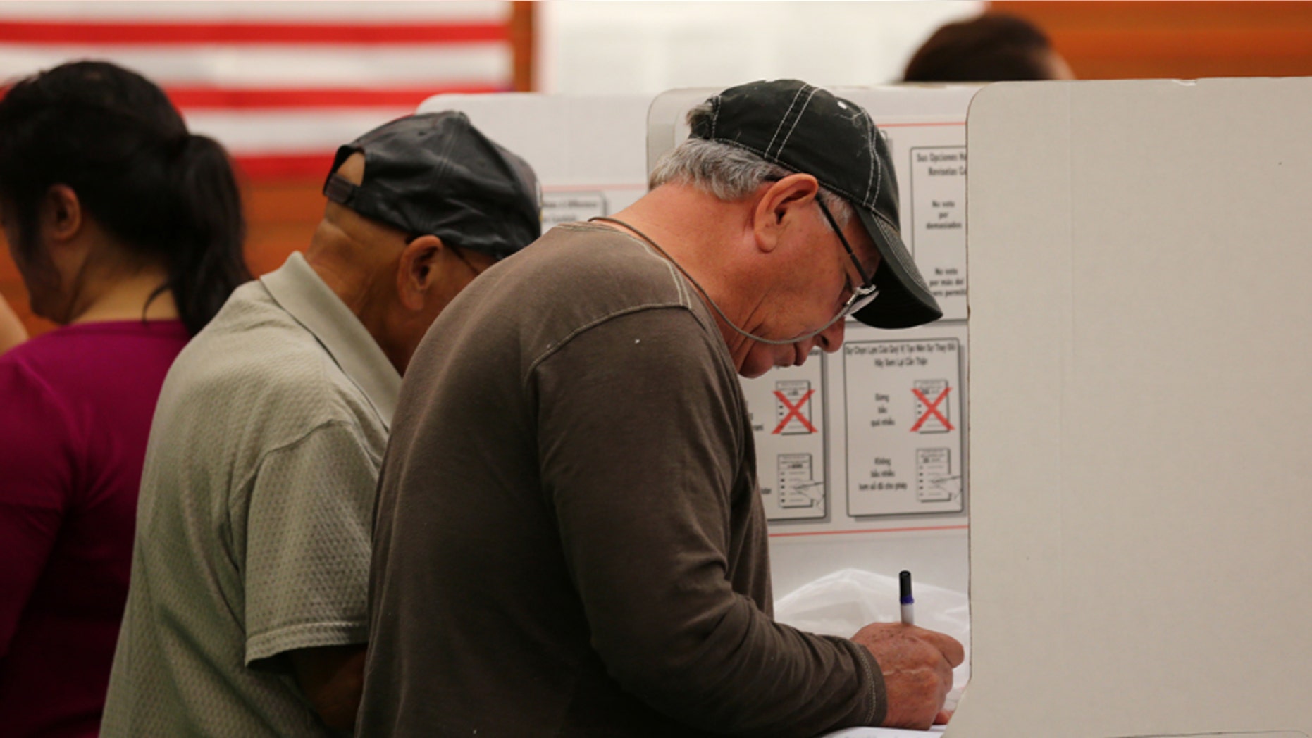 California voters are seen casting ballots in the November 2016 election. California is one of the states where local jurisdictions use 'ranked-choice voting,' something Maine is struggling to implement statewide.