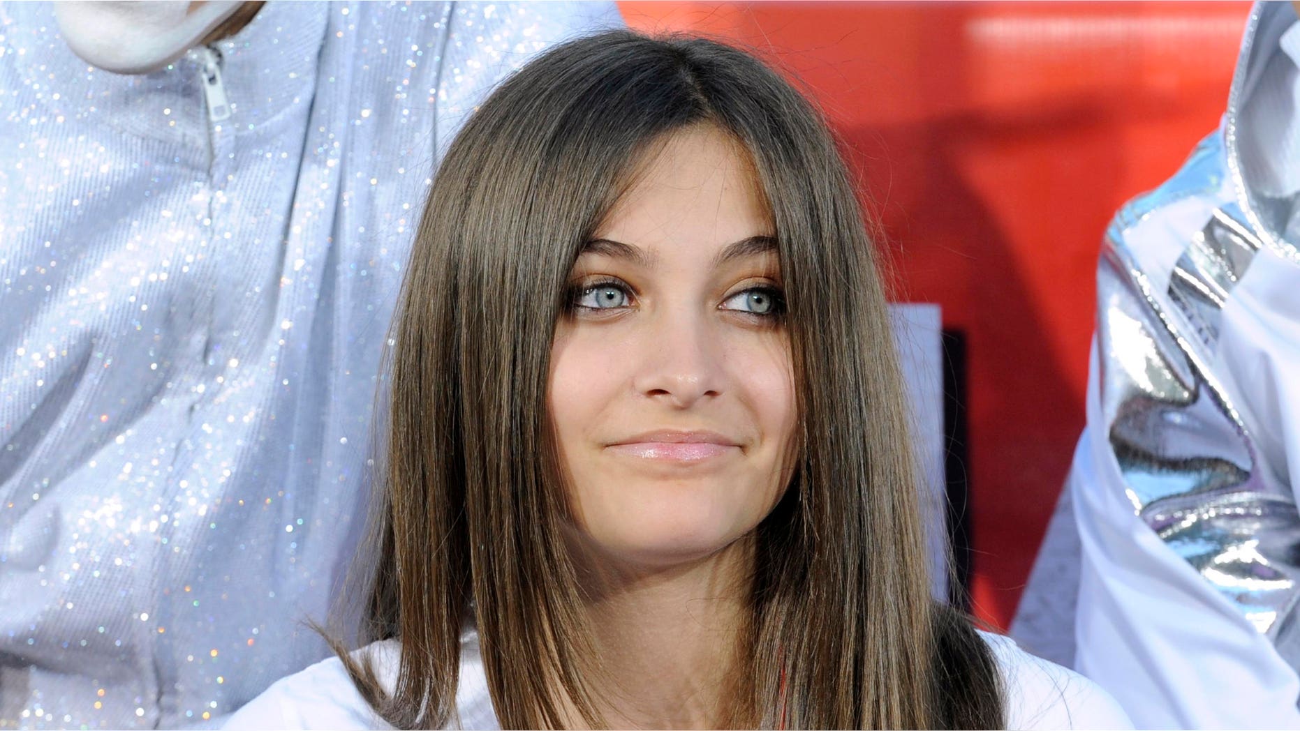 Paris Jackson gives her godfather Macaulay Culkin a pedicure.
