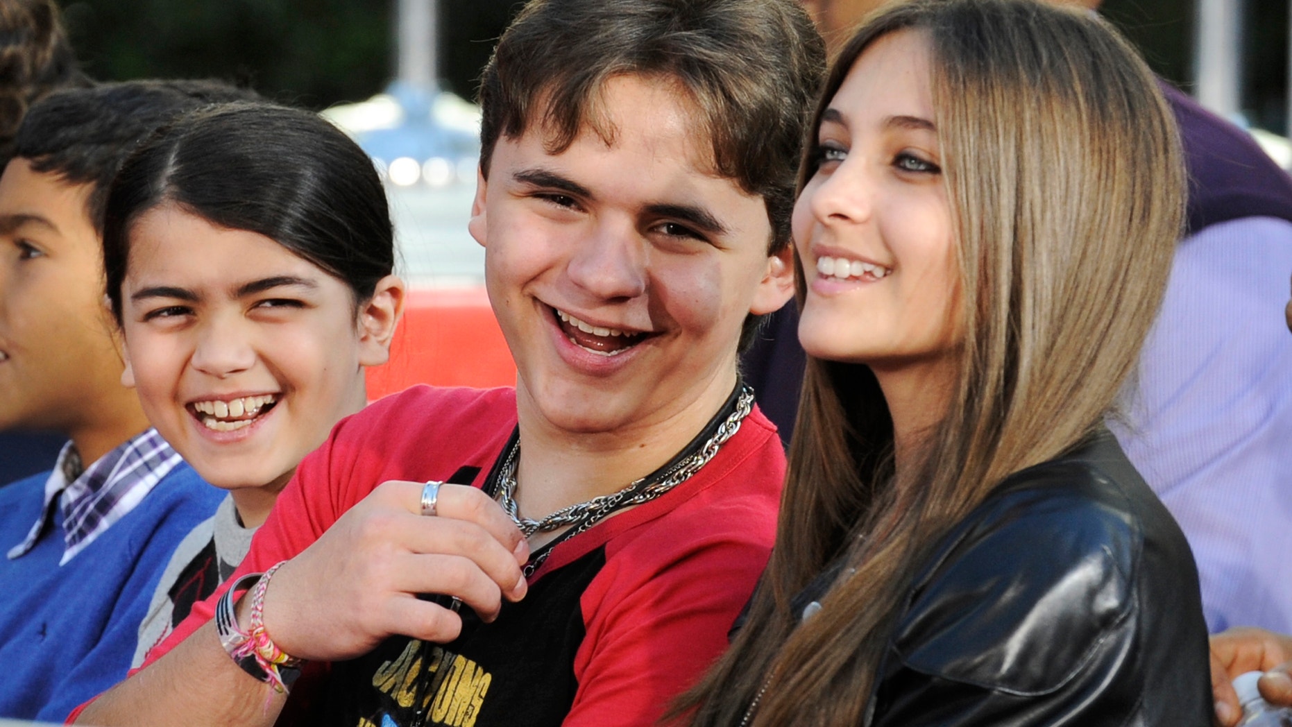 Paris and Prince with their younger brother Blanket.