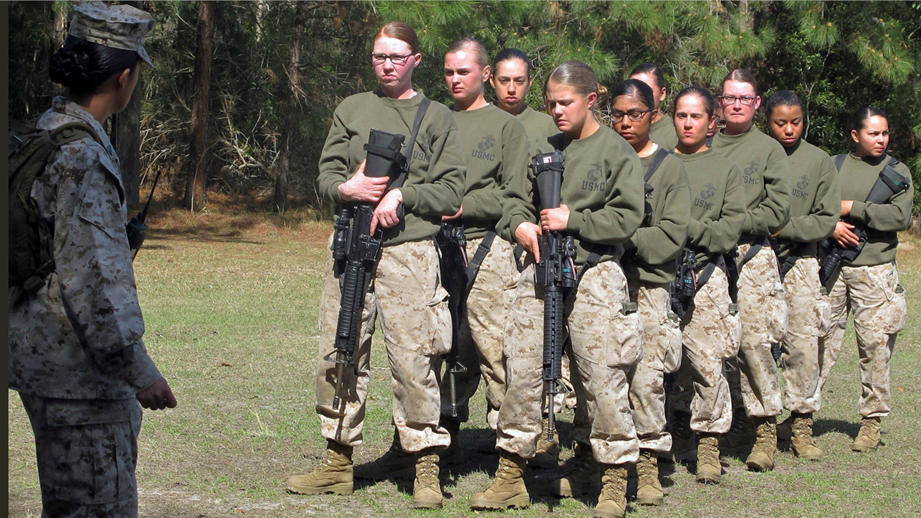 In this Feb. 21, 2013 file photo, female recruits stand at the Marine Corps Training Depot on Parris Island, S.C.