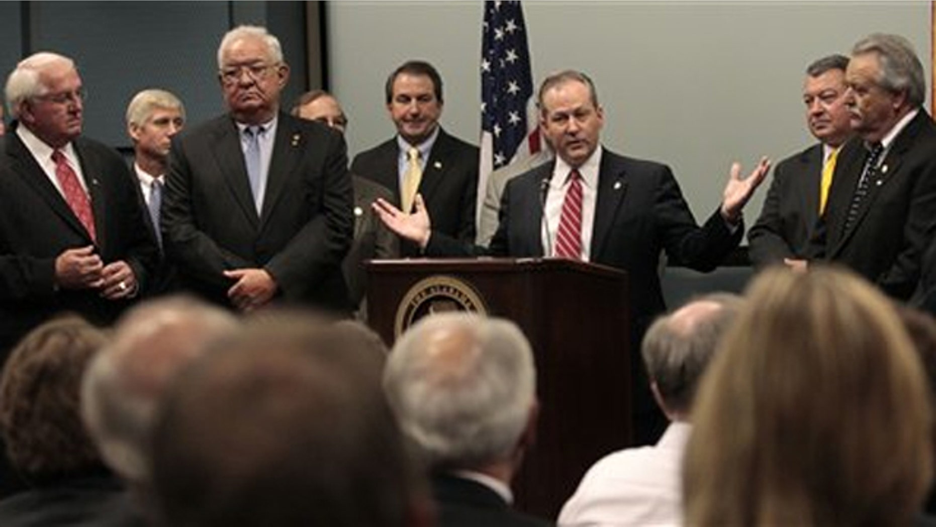 Alabama Republican Party Chairman Mike Hubbard gestures as he welcomes four Democrats to the Republican Party during a news conference in Montgomery, Ala., Nov. 22. (AP Photo)