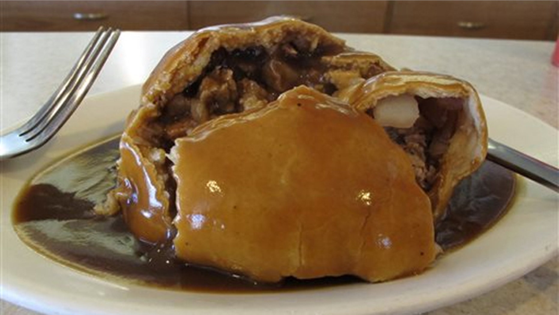 July 20, 2013:A meat-filled pasty with gravy from Joe's Pasty Shop in Butte, Mont.